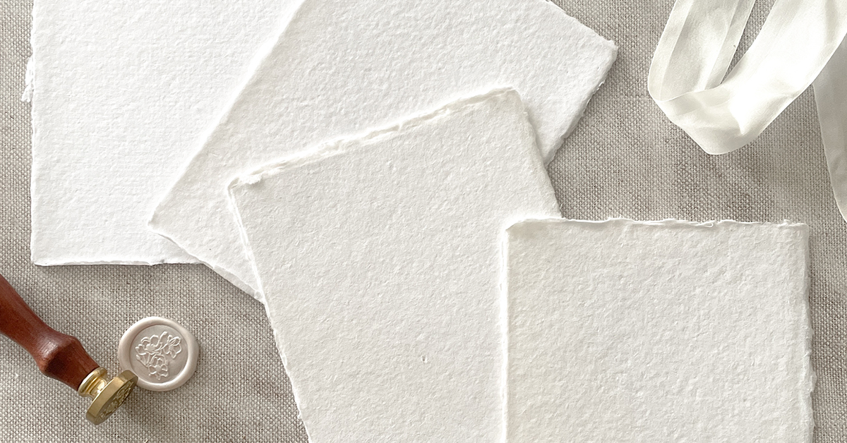 premium-white-recycled-handmade-paper-and-card-in-white.png?v=1721921783