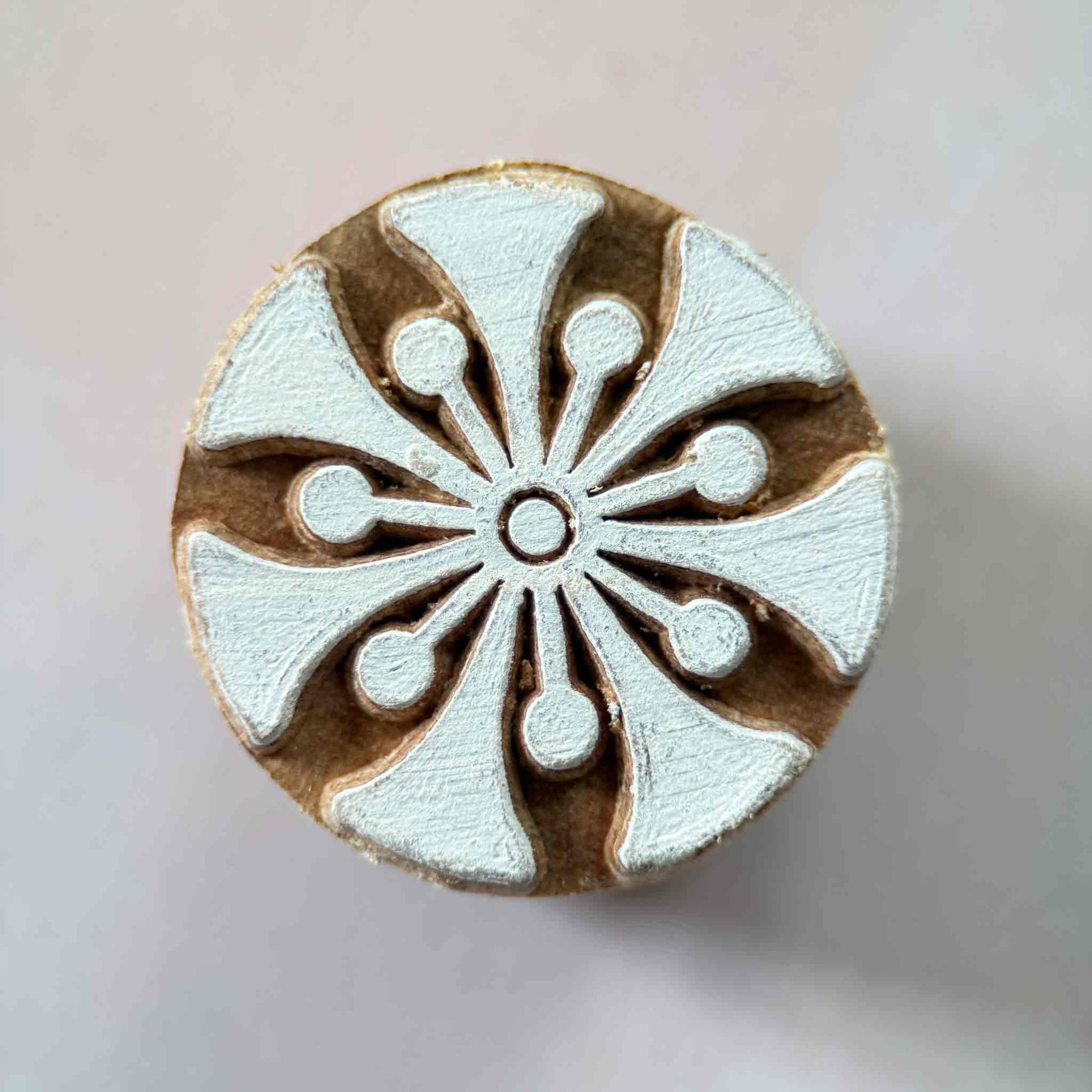 Wooden stamp with a floral pattern 