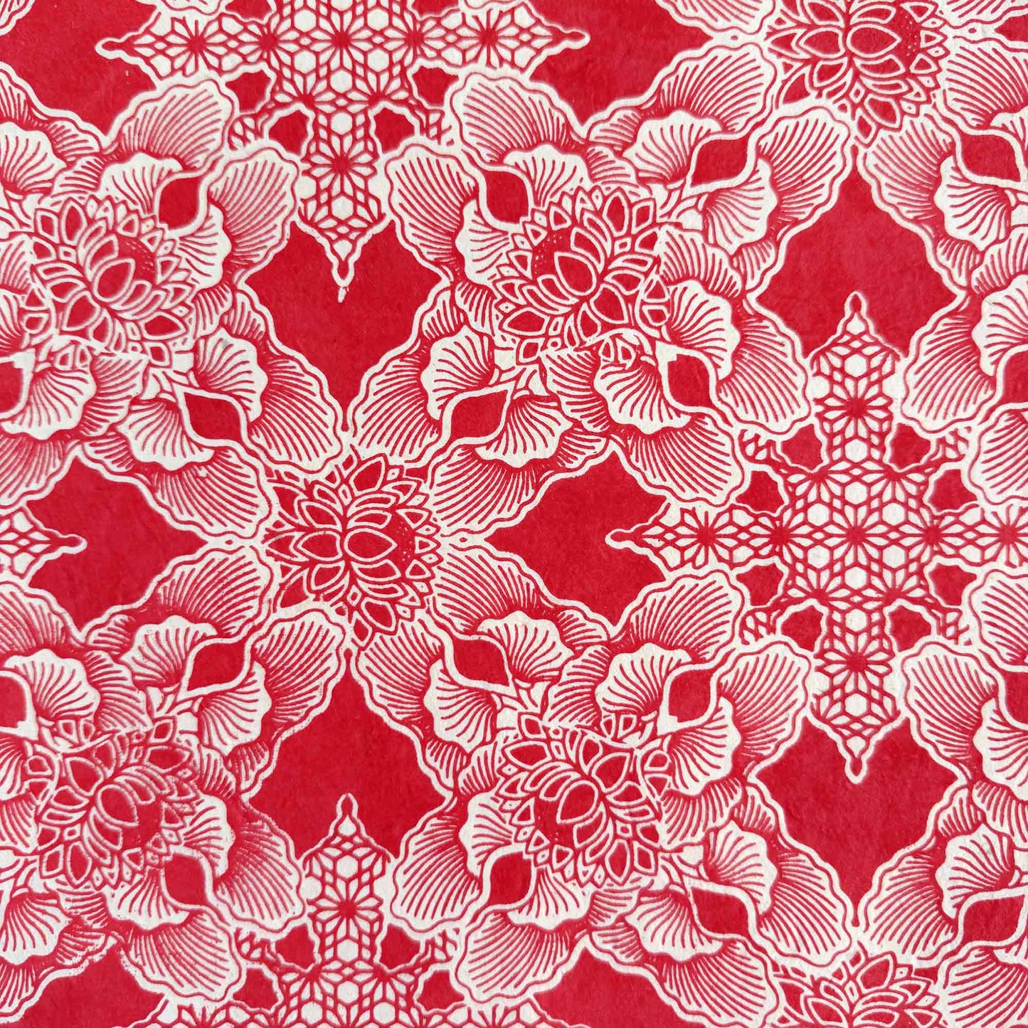 red and white floral pattern gift wrap made from Lokta paper