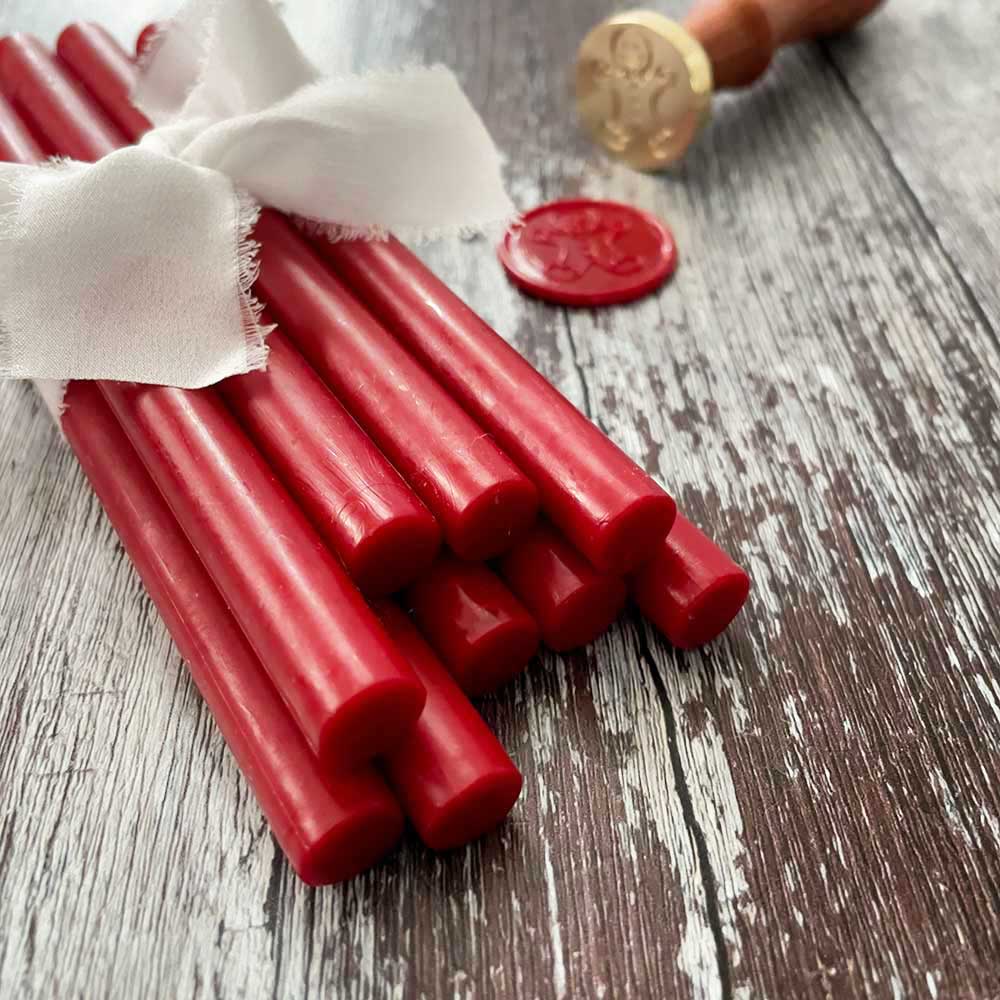 Berry red sealing wax sticks to make bright red wax seals.  Perfect for seasonal projects.  Eco friendly wax seal wax.  Plastic free, paraffin free and biodegradable.  By The Natural Paper Company