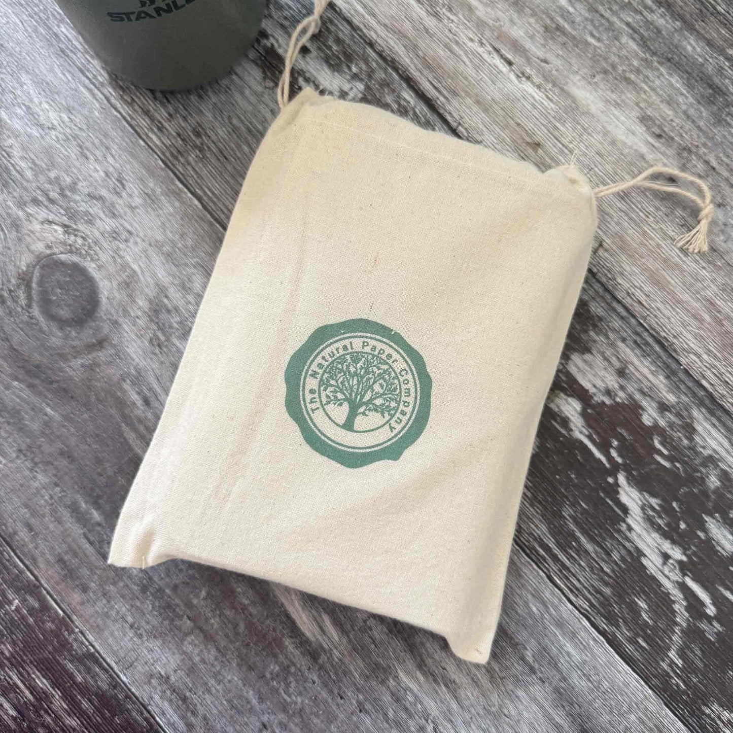Silver leather refillable journal presented in gift bag — ready for gifting