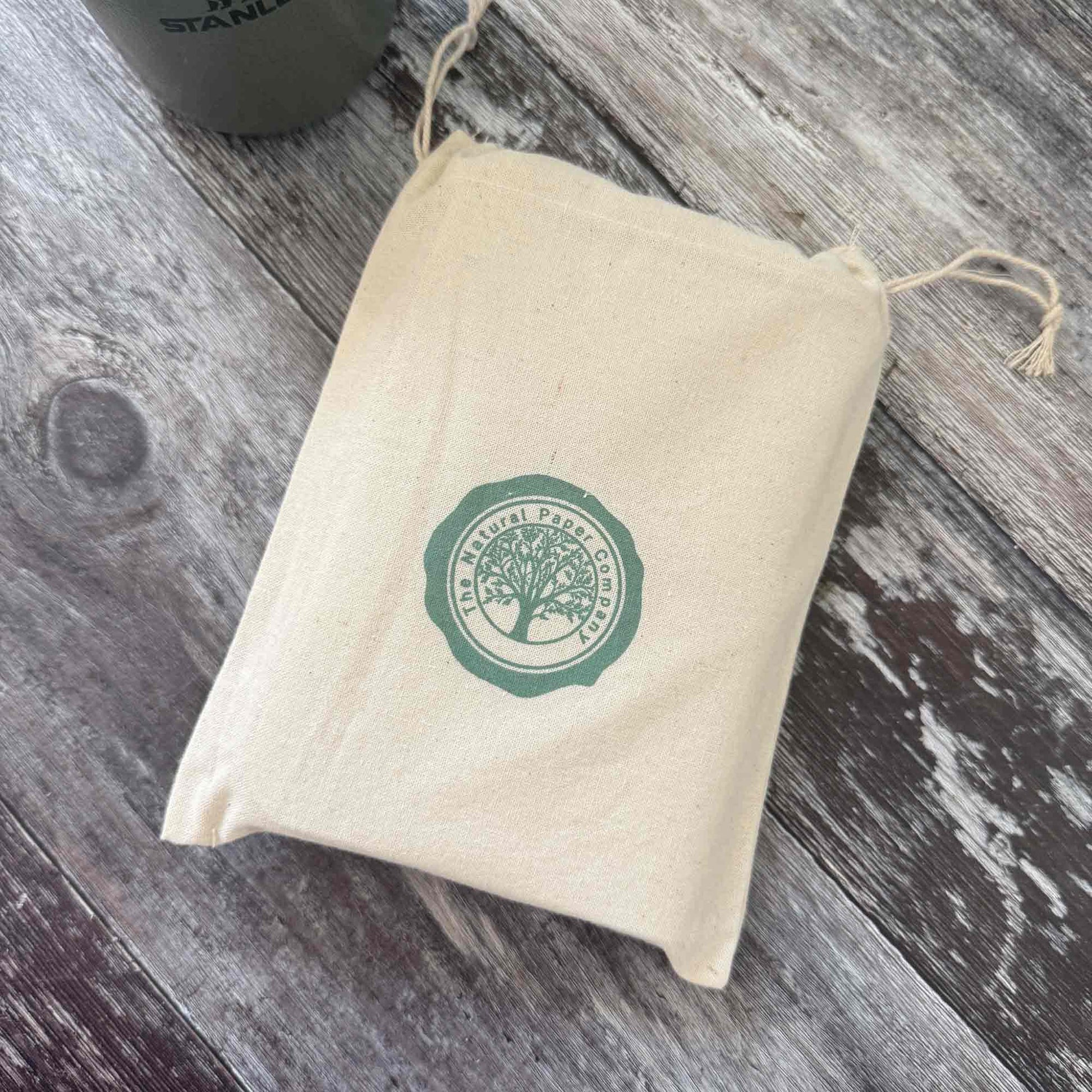 Silver leather refillable journal presented in gift bag — ready for gifting