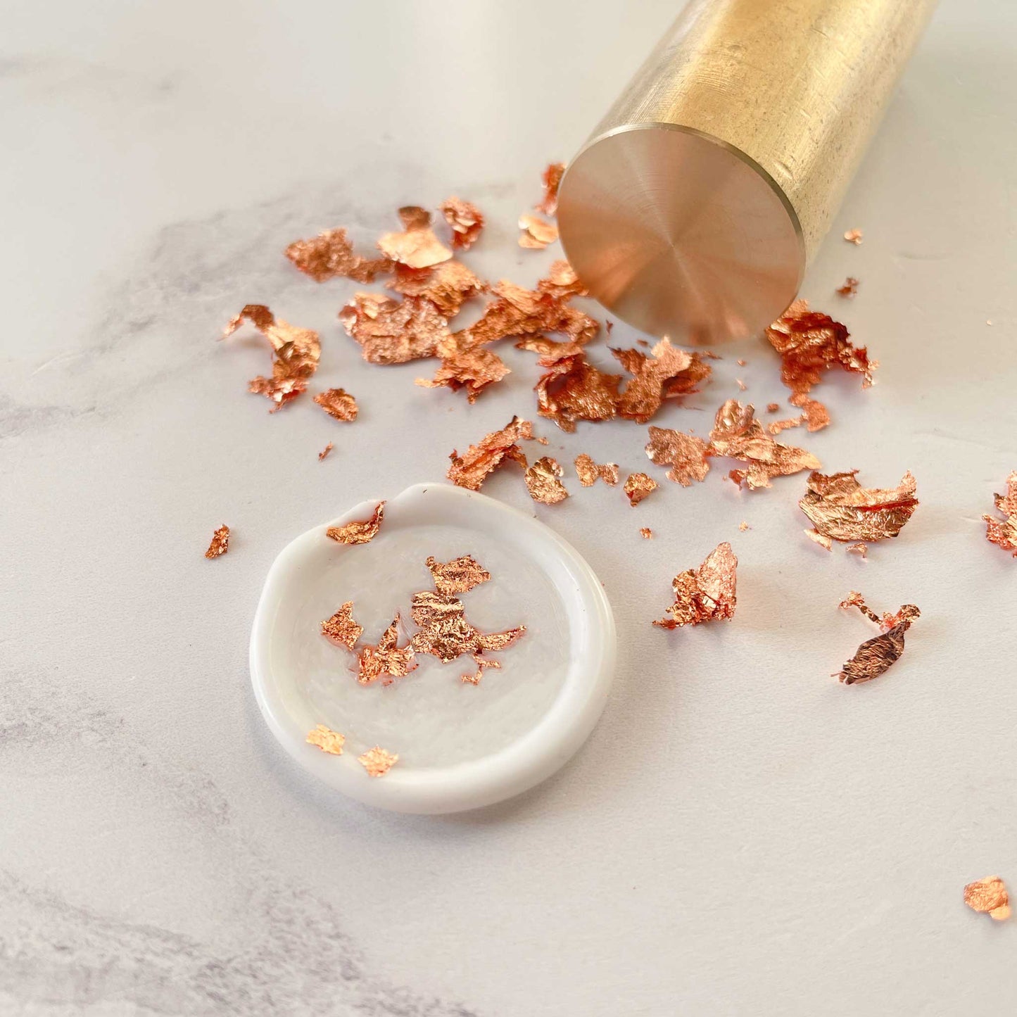 Rose gold metallic leaf flakes to decorate wax seals.  Add metallic copper details to your sealing wax.  By The Natural Paper Company