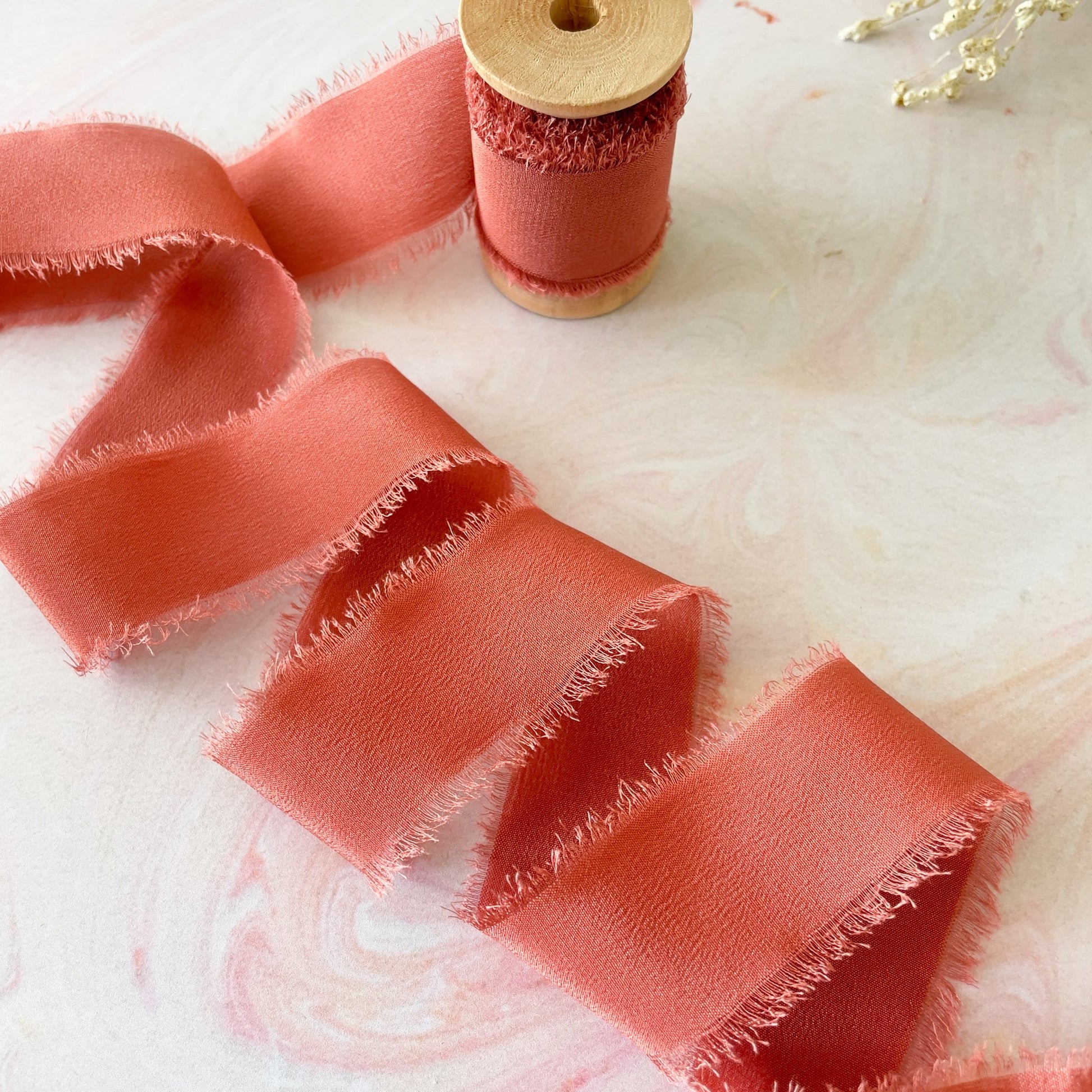 Burnt orange silk ribbon for crafts.  Luxury silk ribbon with a frayed edge.  By The Natural Paper Company.