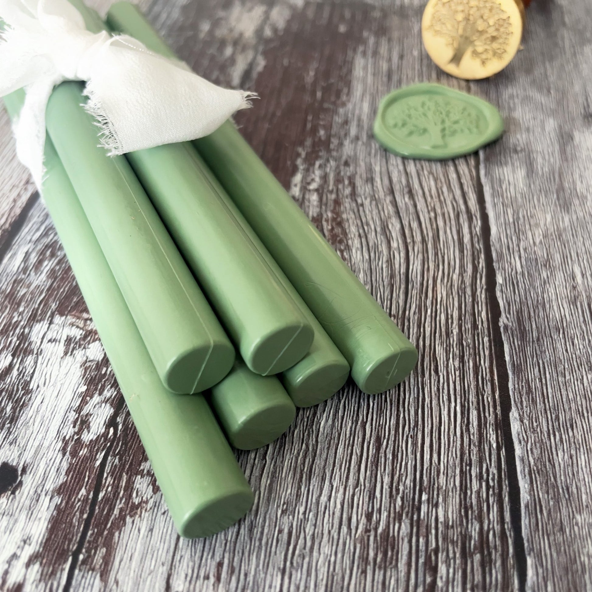 Khaki green wax to make wax seals.  11mm sealing wax sticks made from plastic free, paraffin free, biodegradable wax.  By The Natural Paper Company