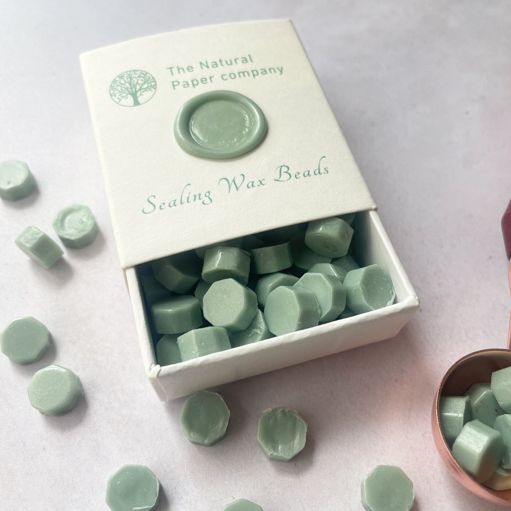 Sealing Wax Beads in Sage Green.  Small beads of wax to make wax seals.  A box of eco friendly wax seal wax.  Plastic free, paraffin free and biodegradable.  By The Natural paper Company