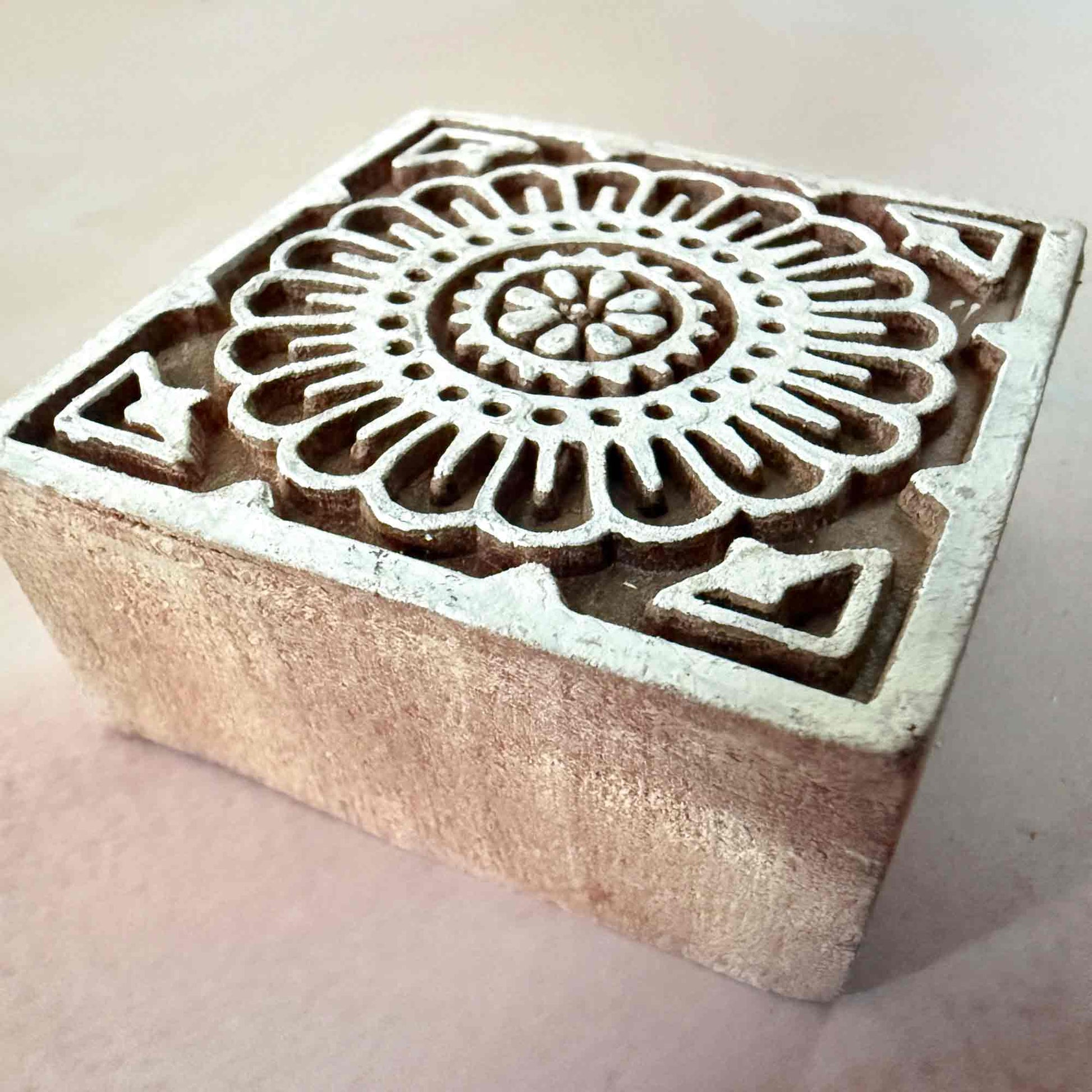 Square wooden stamp with floral design 