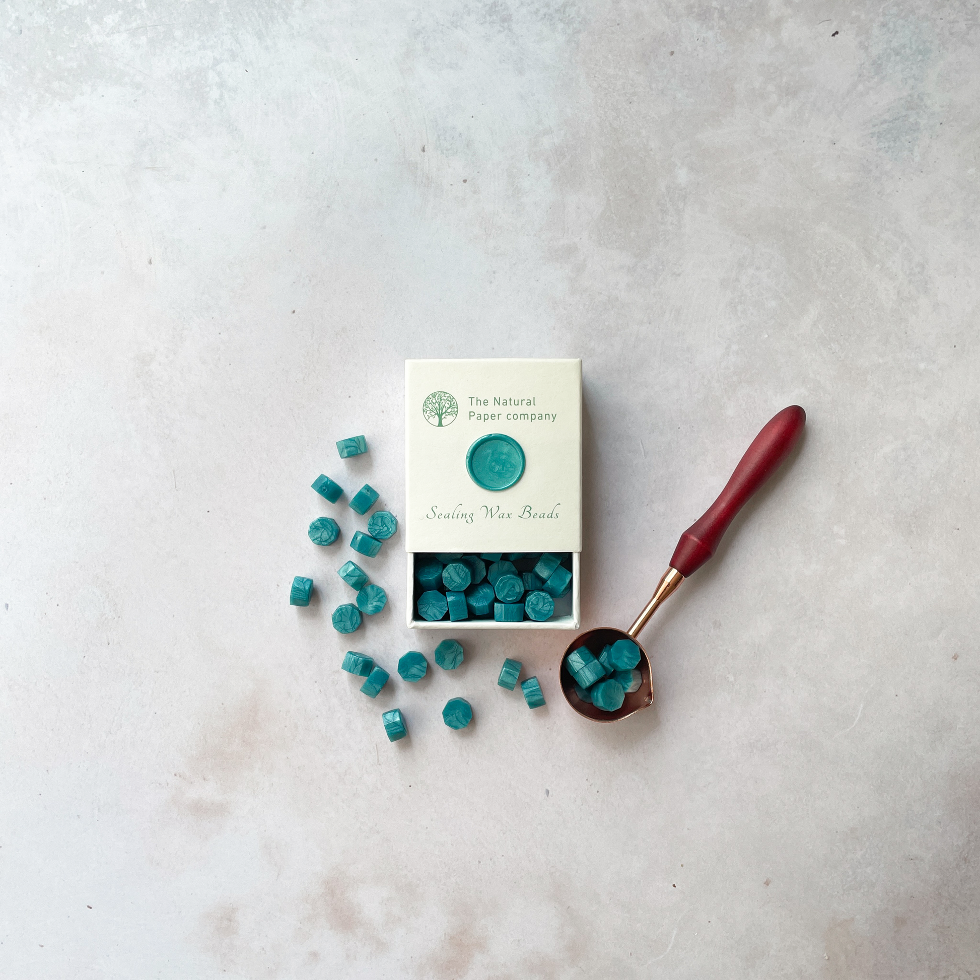 Sea green sealing wax beads to make wax seals with a stamp.  Eco friendly wax for wax stamping.  By The Natural paper Company