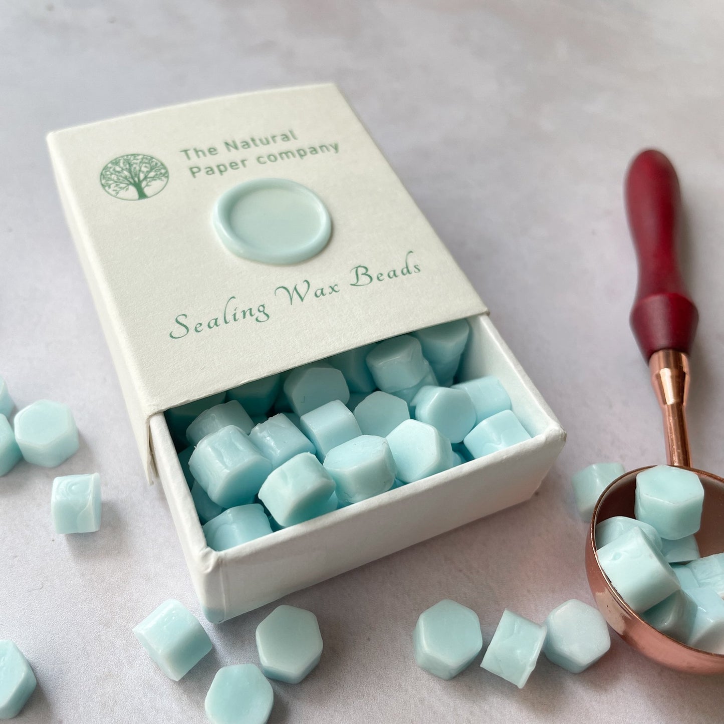 Plastic free sealing wax beads by The Natural Paper Company.  Aqua wax for making wax seals.  By The Natural paper Company