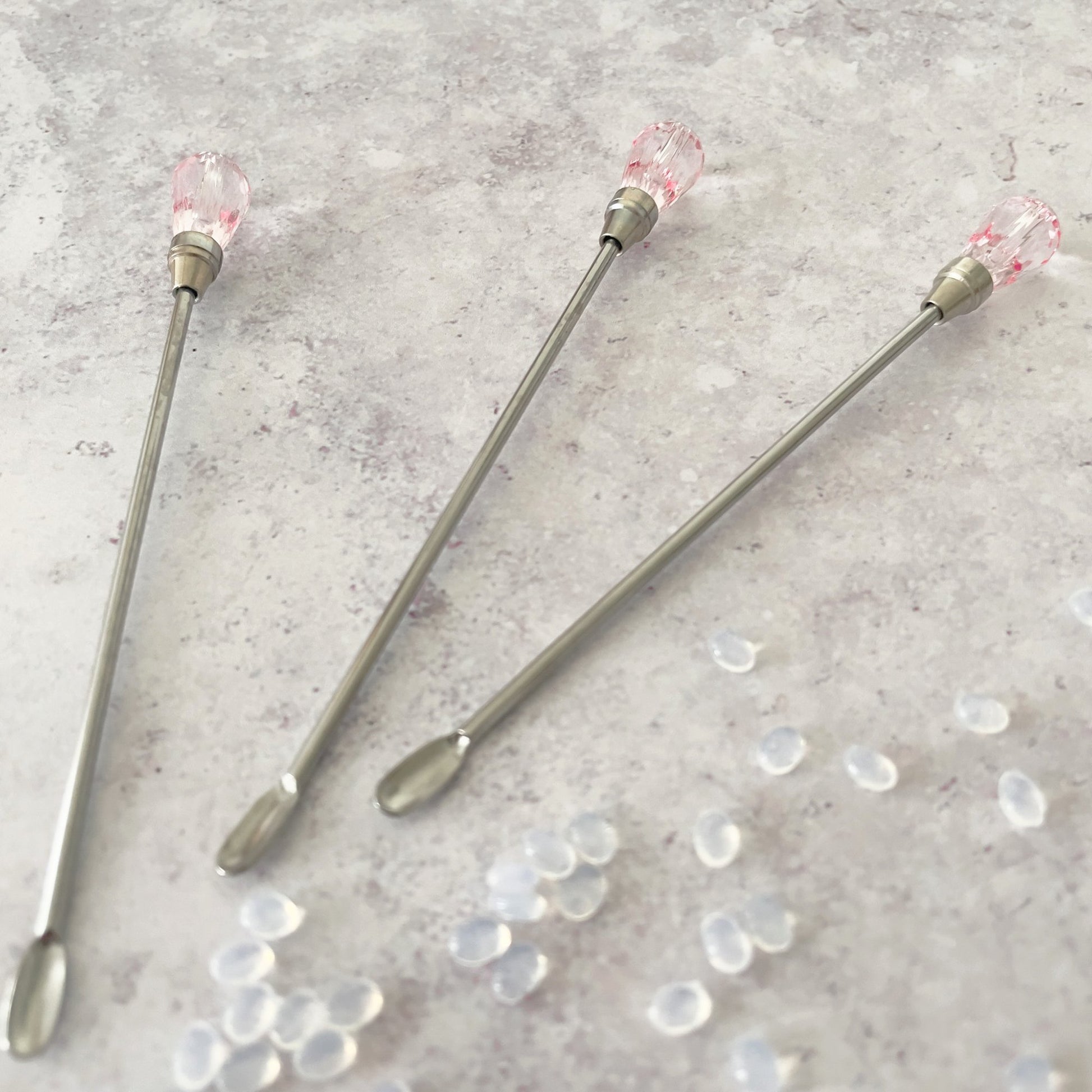 Silver stirring bar with a pink crystal head.  Sealing wax stirring spoon By The Natural Paper Company