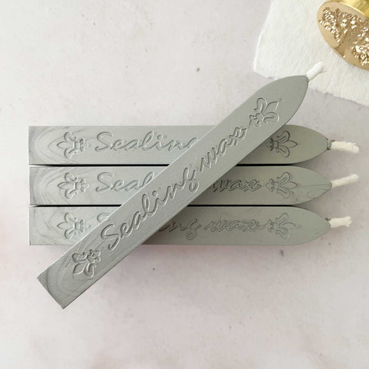 silver sealing wax sticks.  Metallic silver wax for making stamps and seals.  Perfect for wedding invitations and stationery