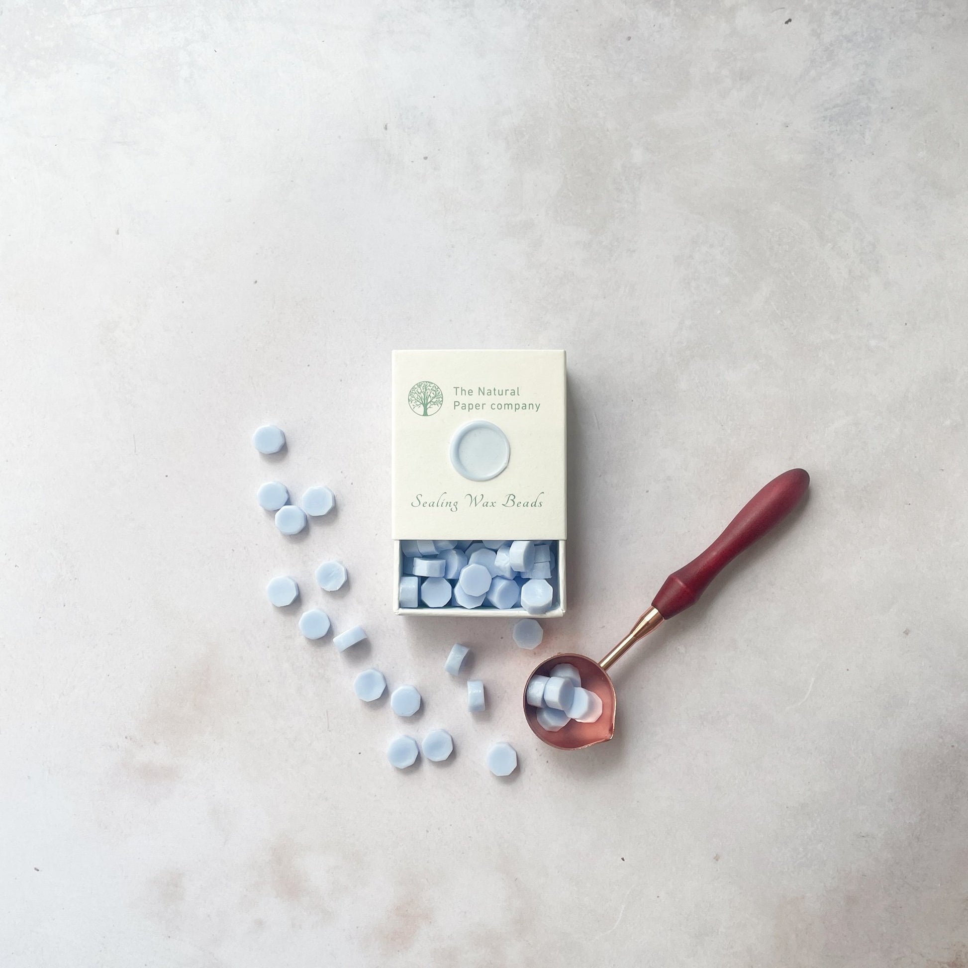 Sealing wax beads in sky blue.  Box of eco friendly wax to make wax seals with a stamp.  By The Natural paper Company