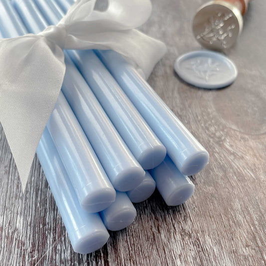 Light blue eco friendly sealing wax sticks By The Natural Paper Company.  11mm Wax seal sticks to make eco friendly wax seals.  Paraffin free, plastic free and eco friendly wax.  By The Natural Paper Company