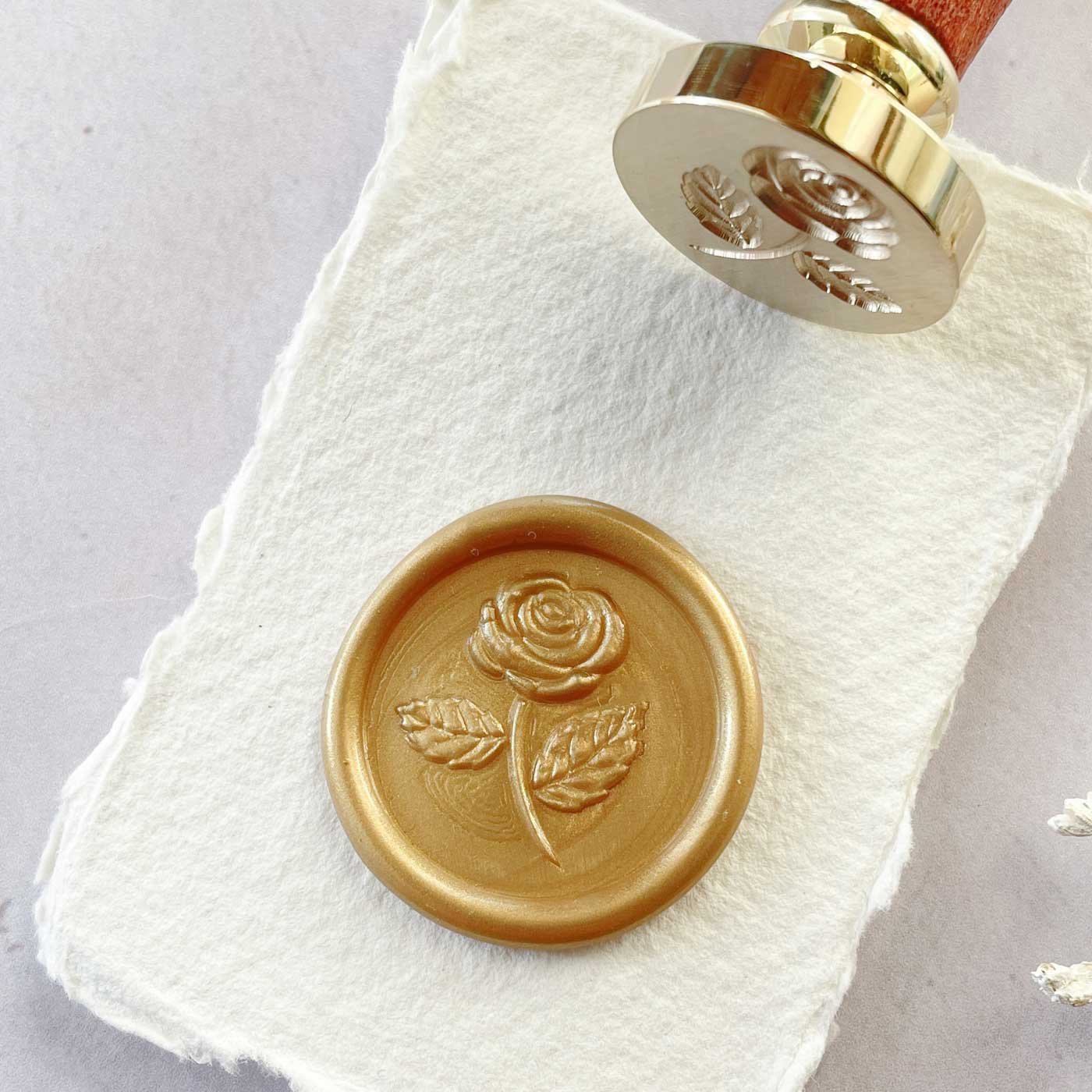 Rose design wax seal stamp for decorating wedding invitations, stationery, envelopes, packaging and more.  by The Natural Paper Company