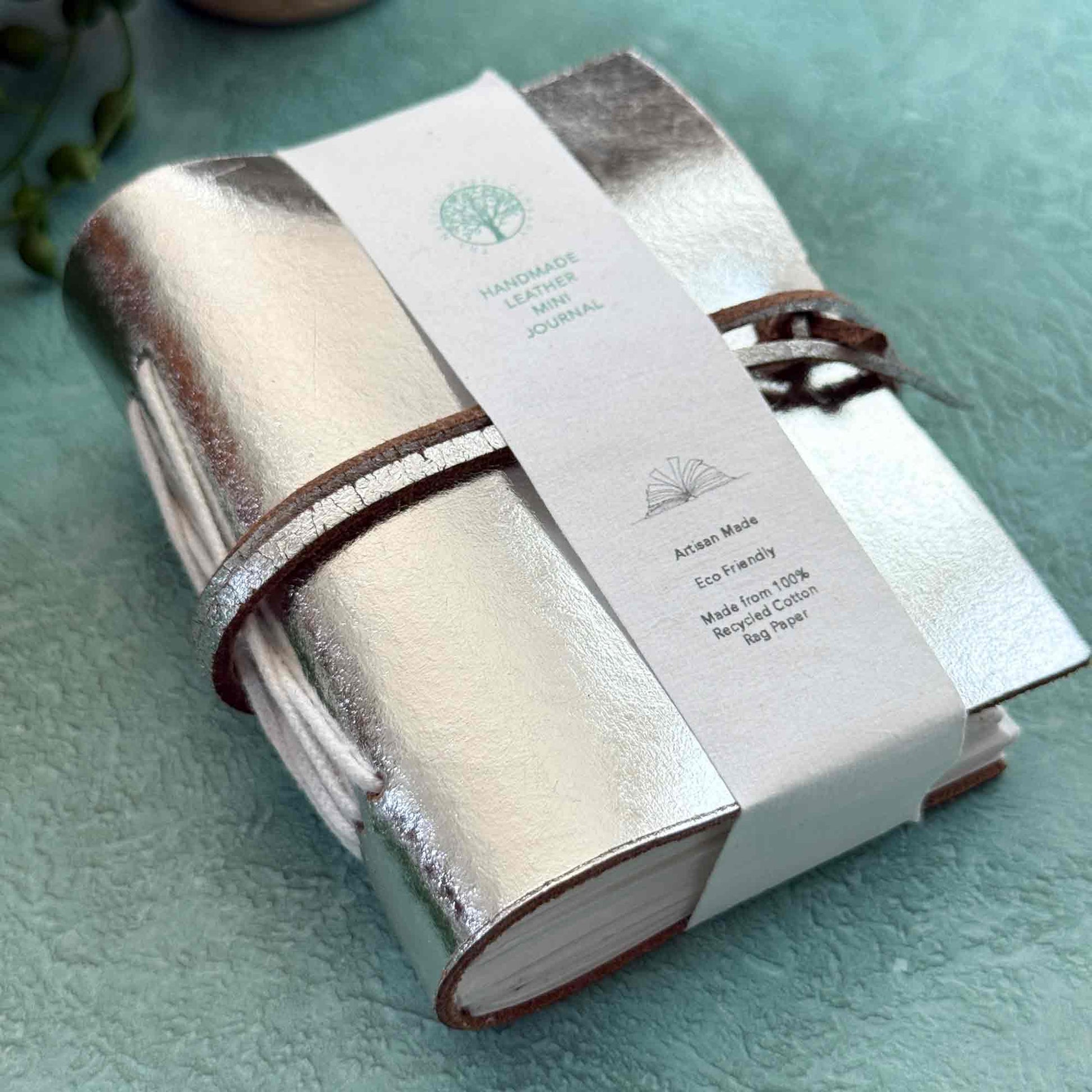 Little handmade leather notebook in silver leather with cotton paper pages