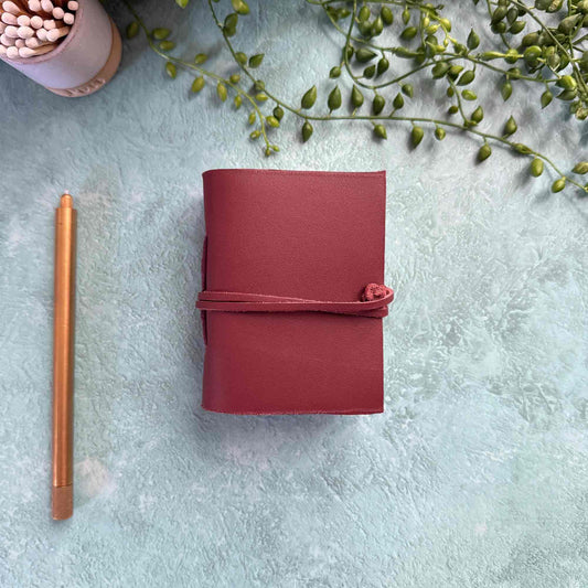 tiny leather notebook in oxblood leather