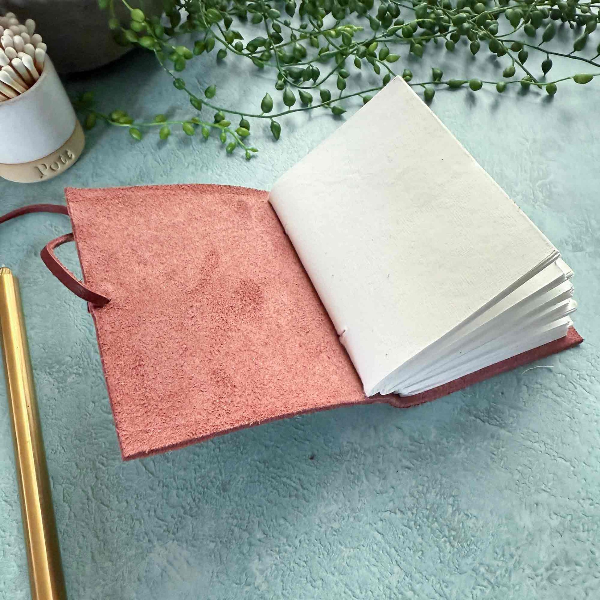 handmade leather notebook with handmade paper pages