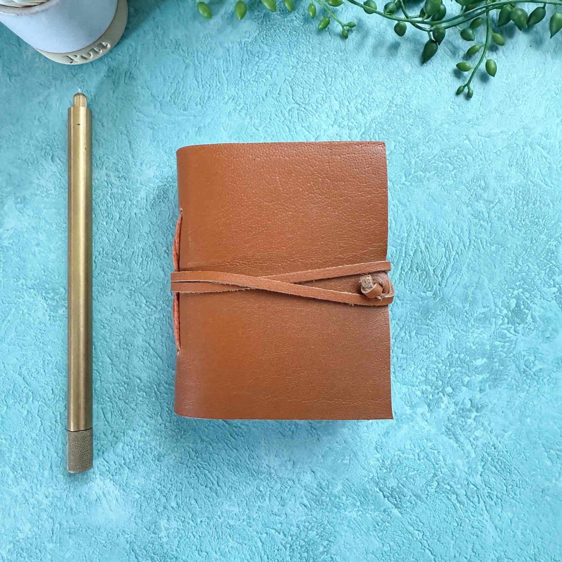 miniature leather pocket notebook in tan