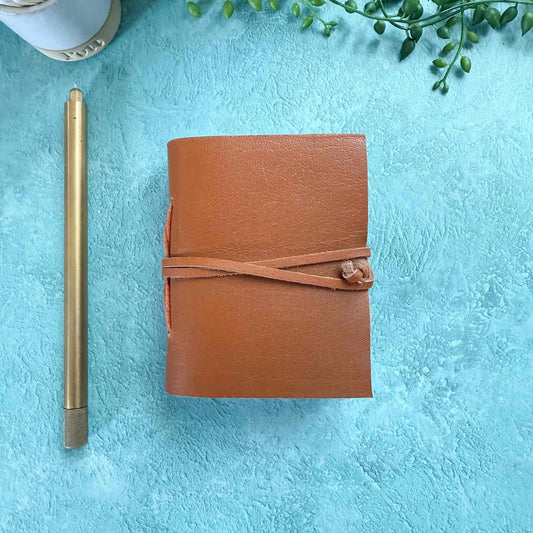 miniature leather pocket notebook in tan
