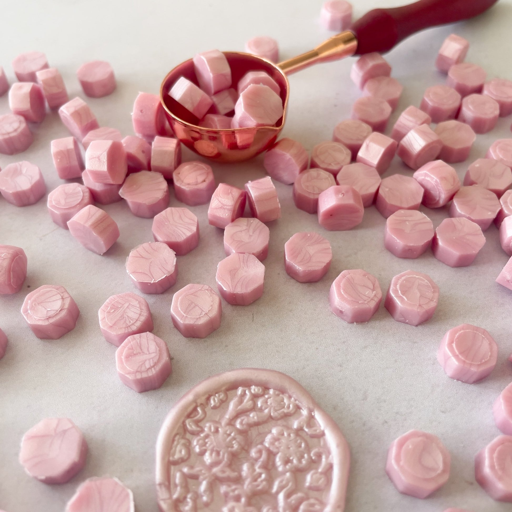 Pink sealing wax beads for making wax seals.  Soft pink sealing wax to use with a melting spoon and stamp.  by The Natural Paper Company