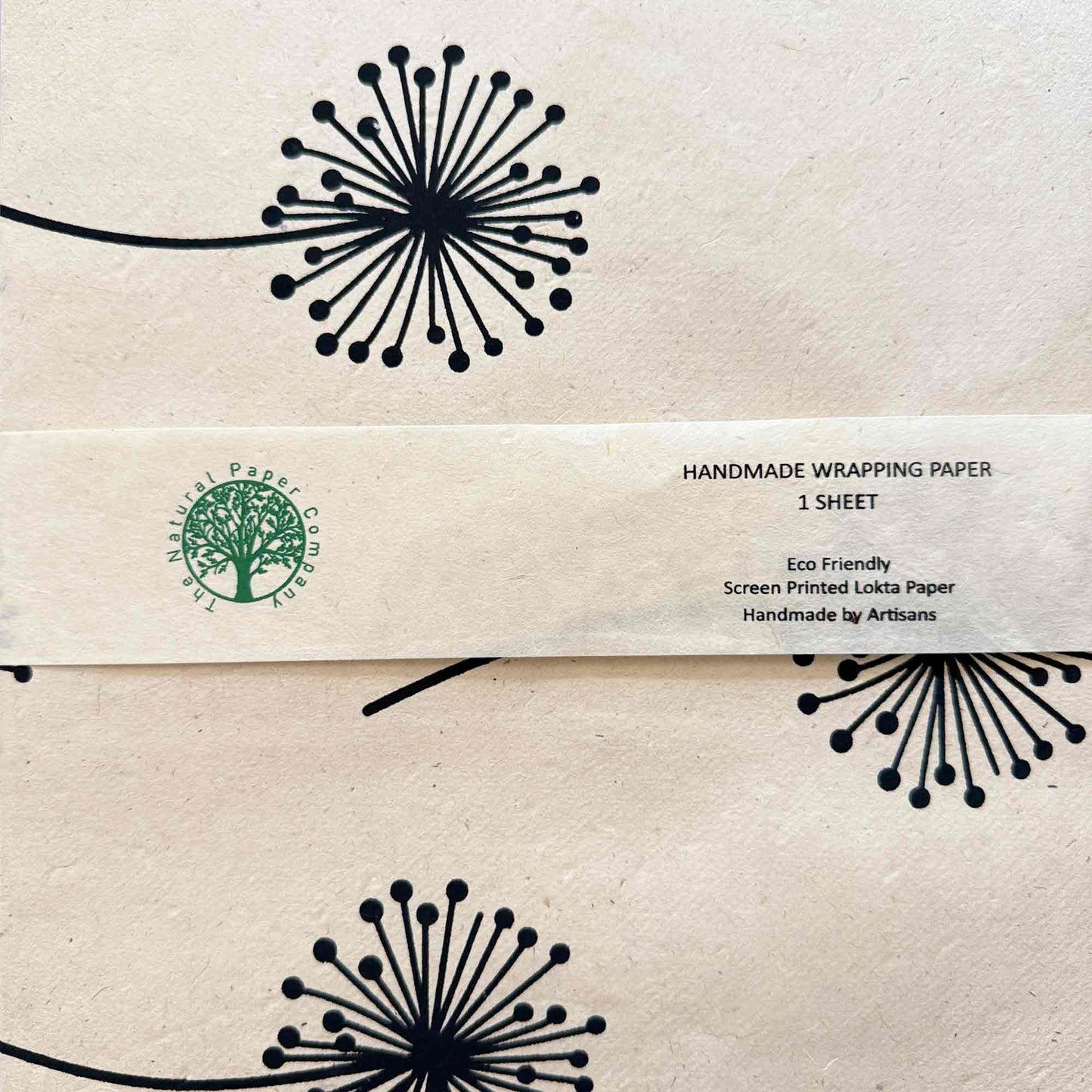 Close up of hand screen printed Lokta paper, dandelion pattern, sustainable gift wrap sheet
