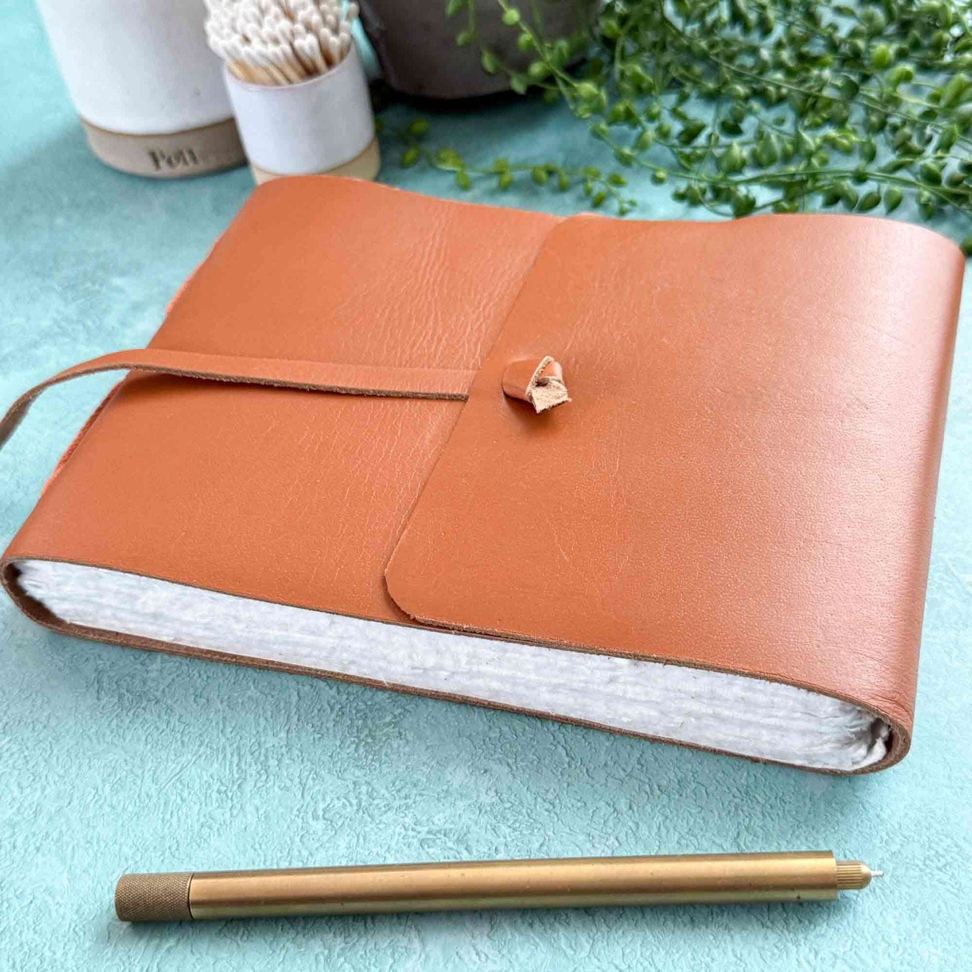 handmade leather journal in tan with cotton paper pages