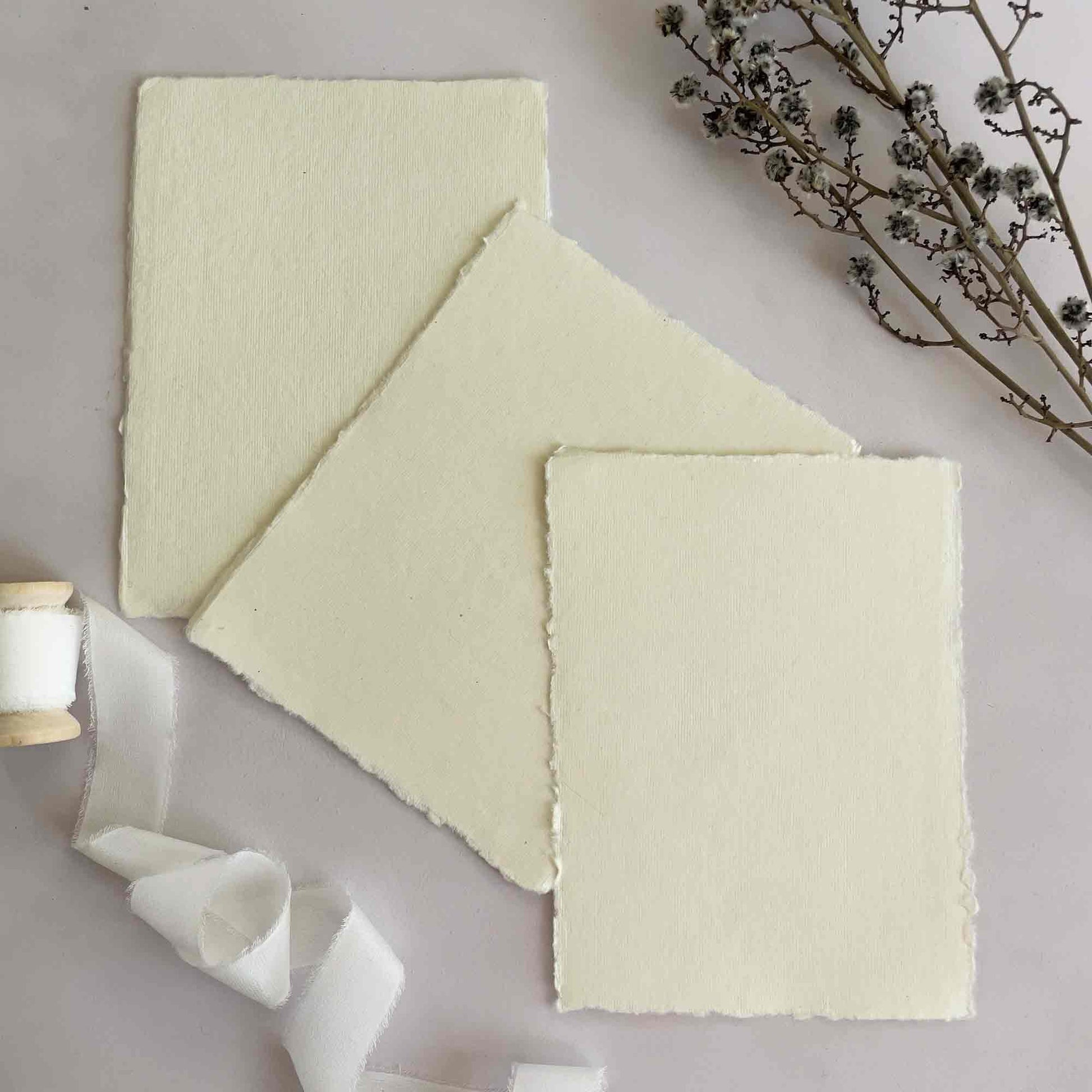 Cream deckle edge handmade paper by The Natural Paper Company.  Made from recycled cotton rag fibres.