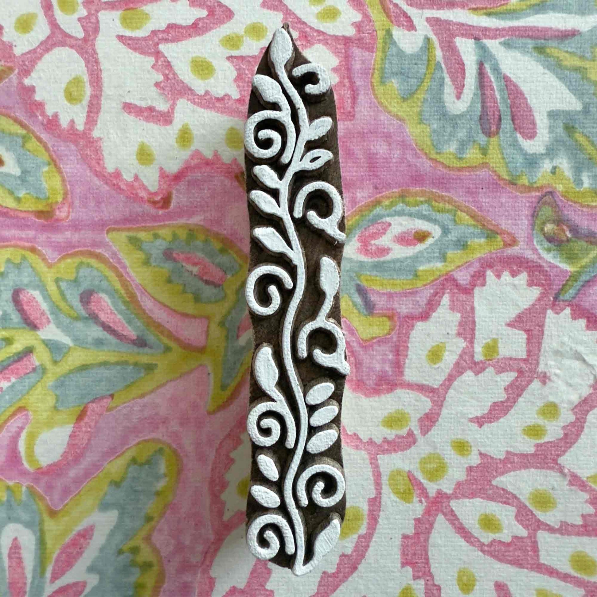 Indian wood block stamp with a botanical pattern