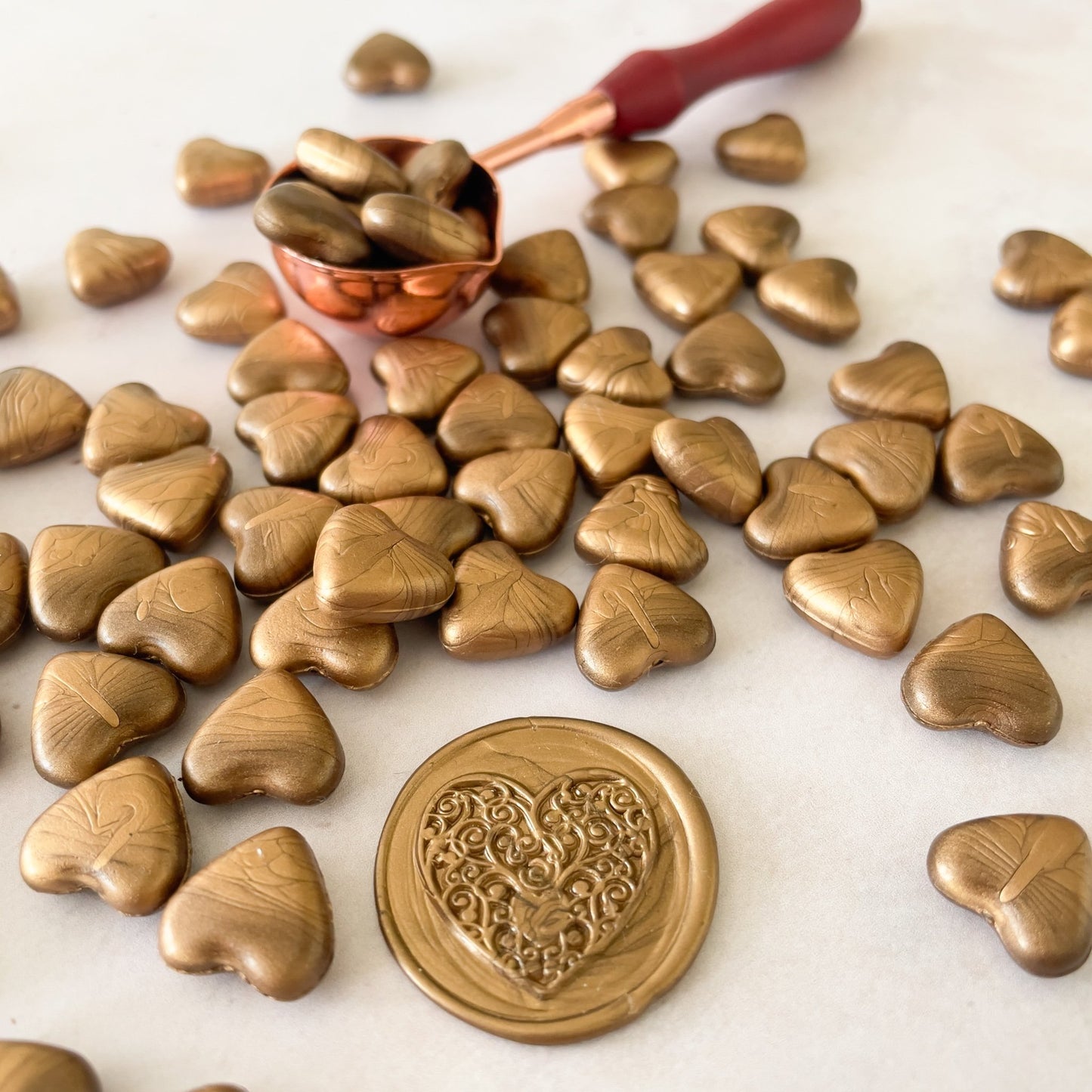 Warm gold wax seal beads.  Wax for wax seals.  Eco friendly beads of wax to use with a melting spoon.  by The Natural Paper Company