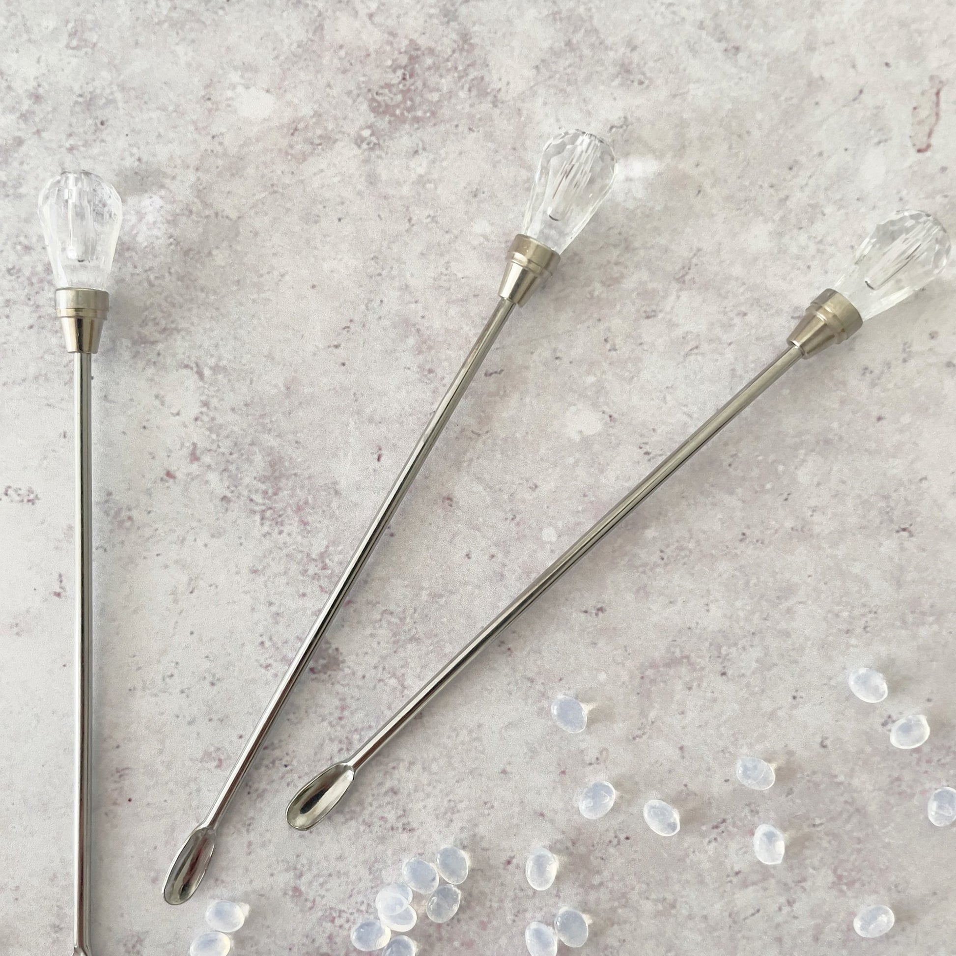 Sealing wax stirrer with a clear crystal head.  Small stirring spoon for wax.  By The Natural Paper Company