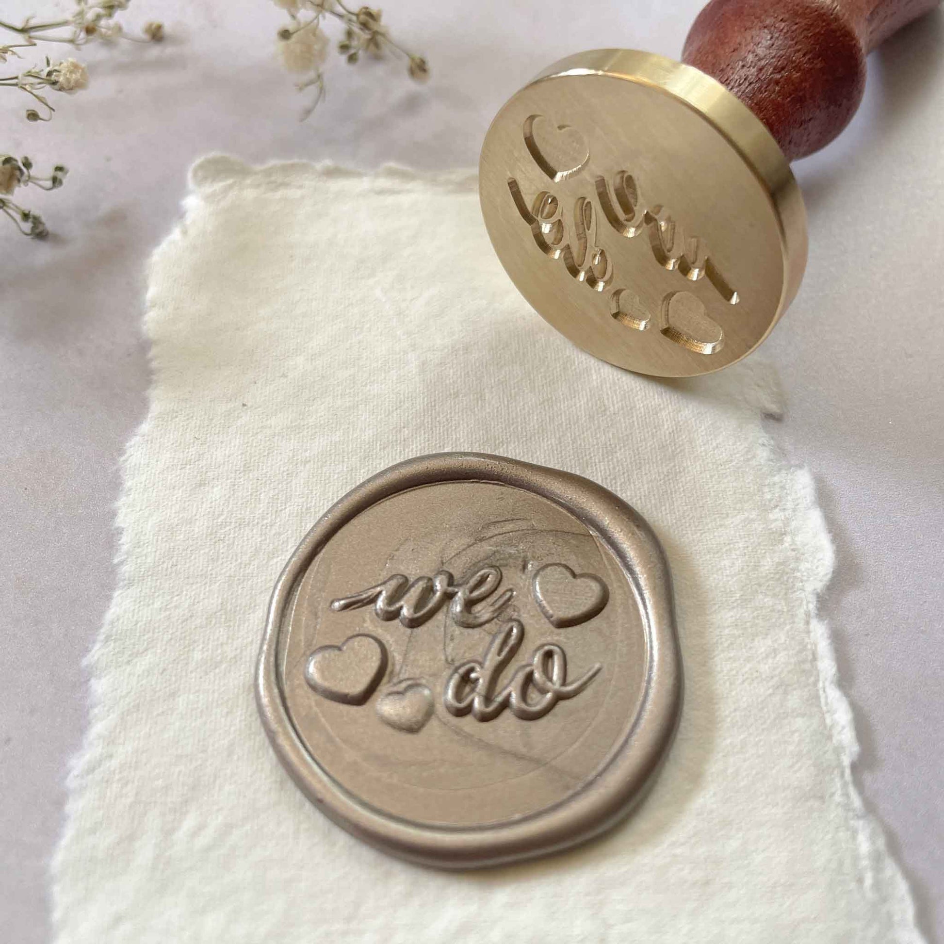 Make We Do wax seals for decorating wedding invitations, engagement announcements and stationery.  A high quality sealing wax stamp by The Natural Paper Company