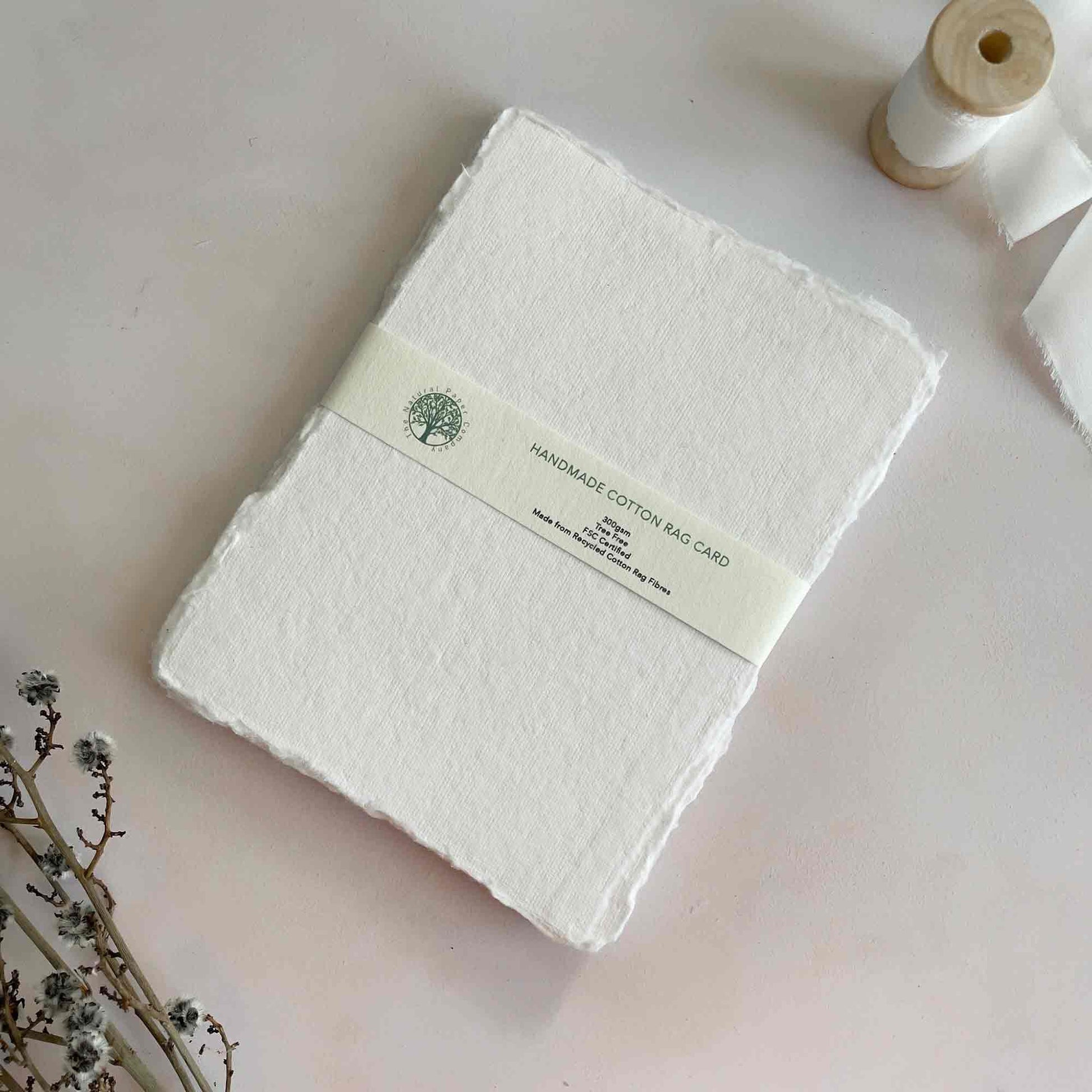 Whisper white handmade cotton rag card panels with deckled edges.  By The Natural Paper Company