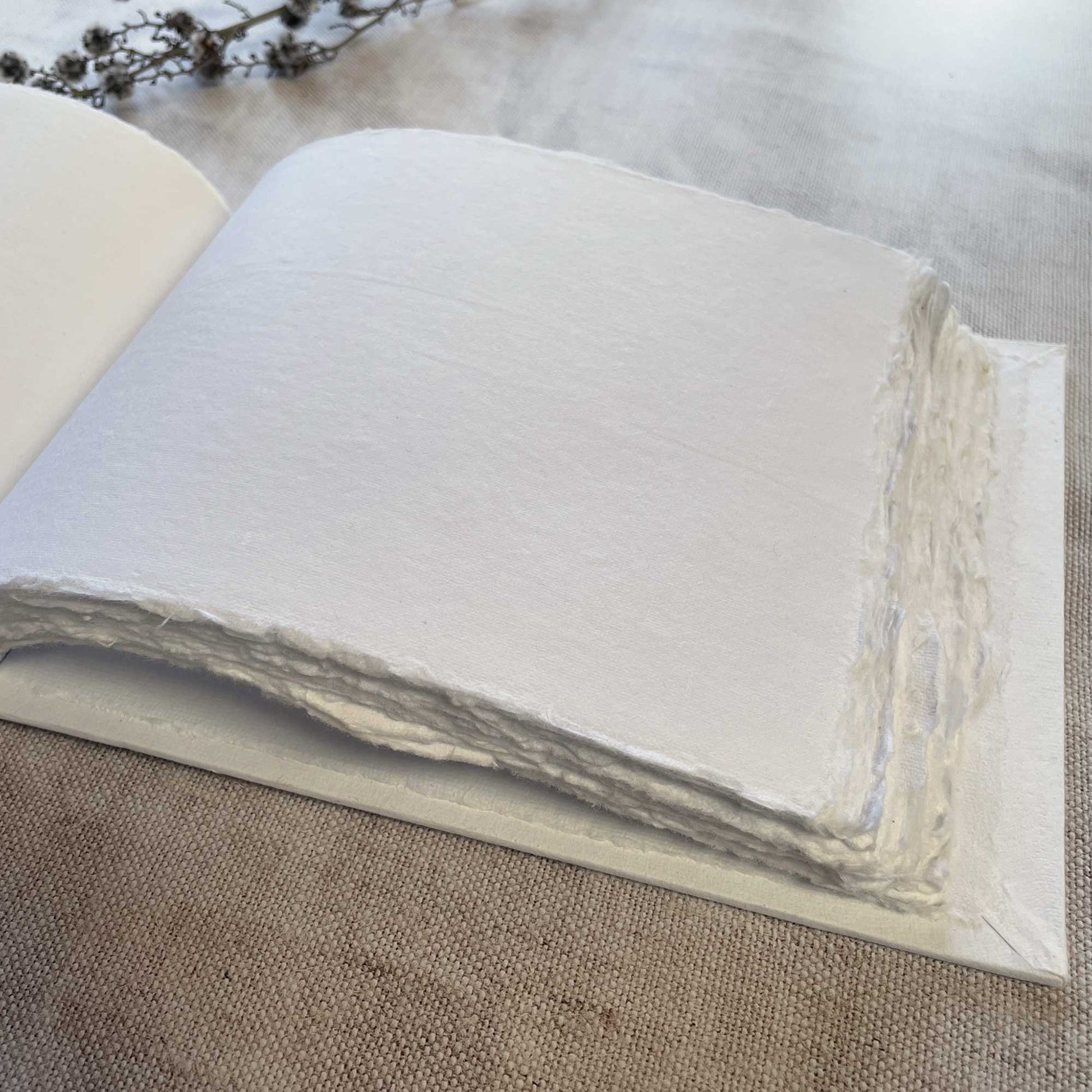 Blank guest book with handmade paper pages.  by The Natural Paper Company