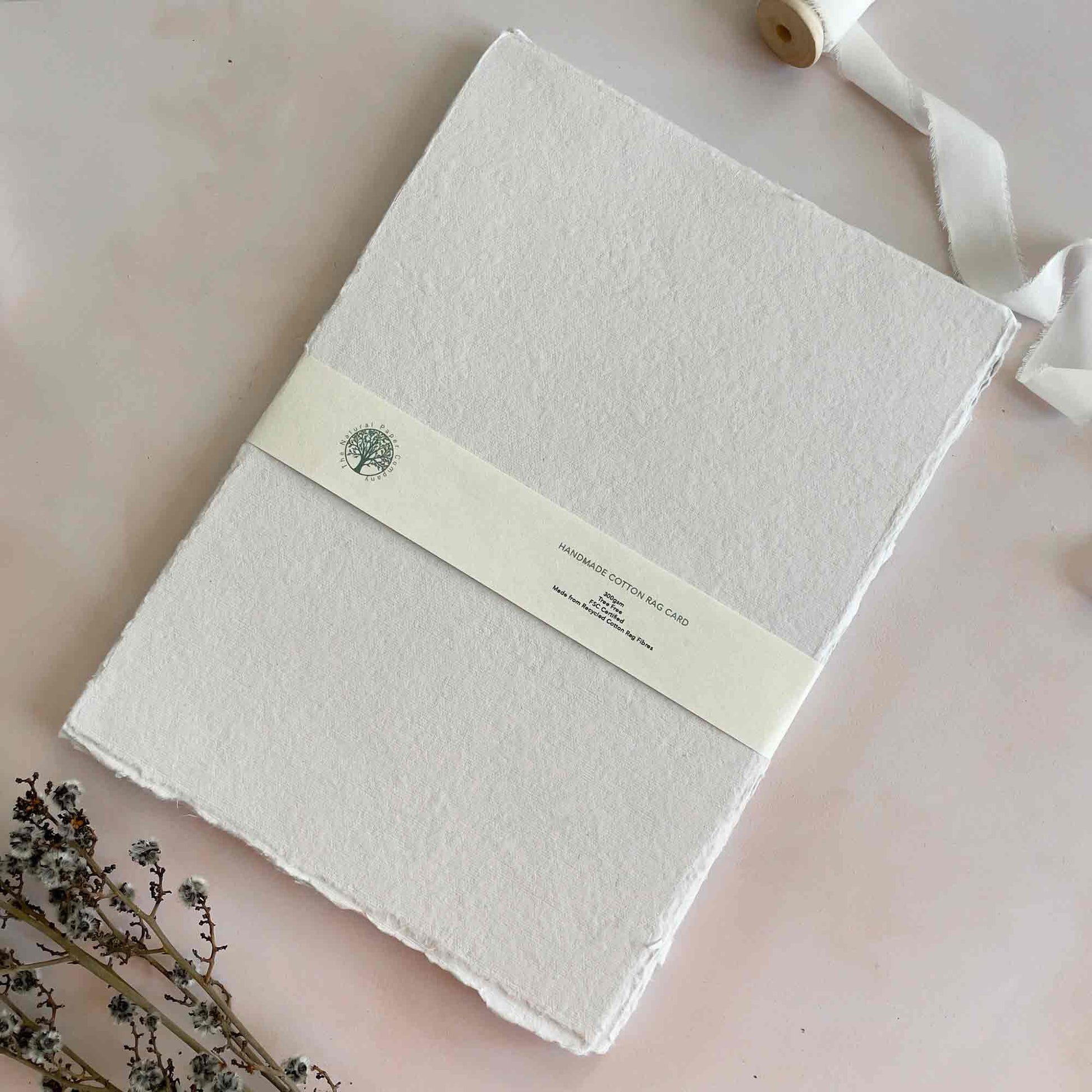 A4 sheets of handmade cotton rag card in white.  Recycled card with deckled edges.  By The Natural Paper Company