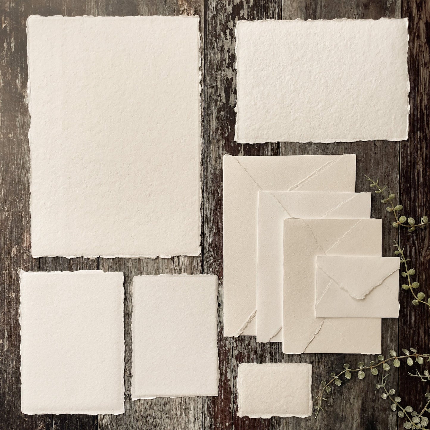 Handmade paper, card and envelopes in white.  Made from recycled cotton rag fibres with a deckled edge.  Vegan watercolour paper.   By The Natural paper Company