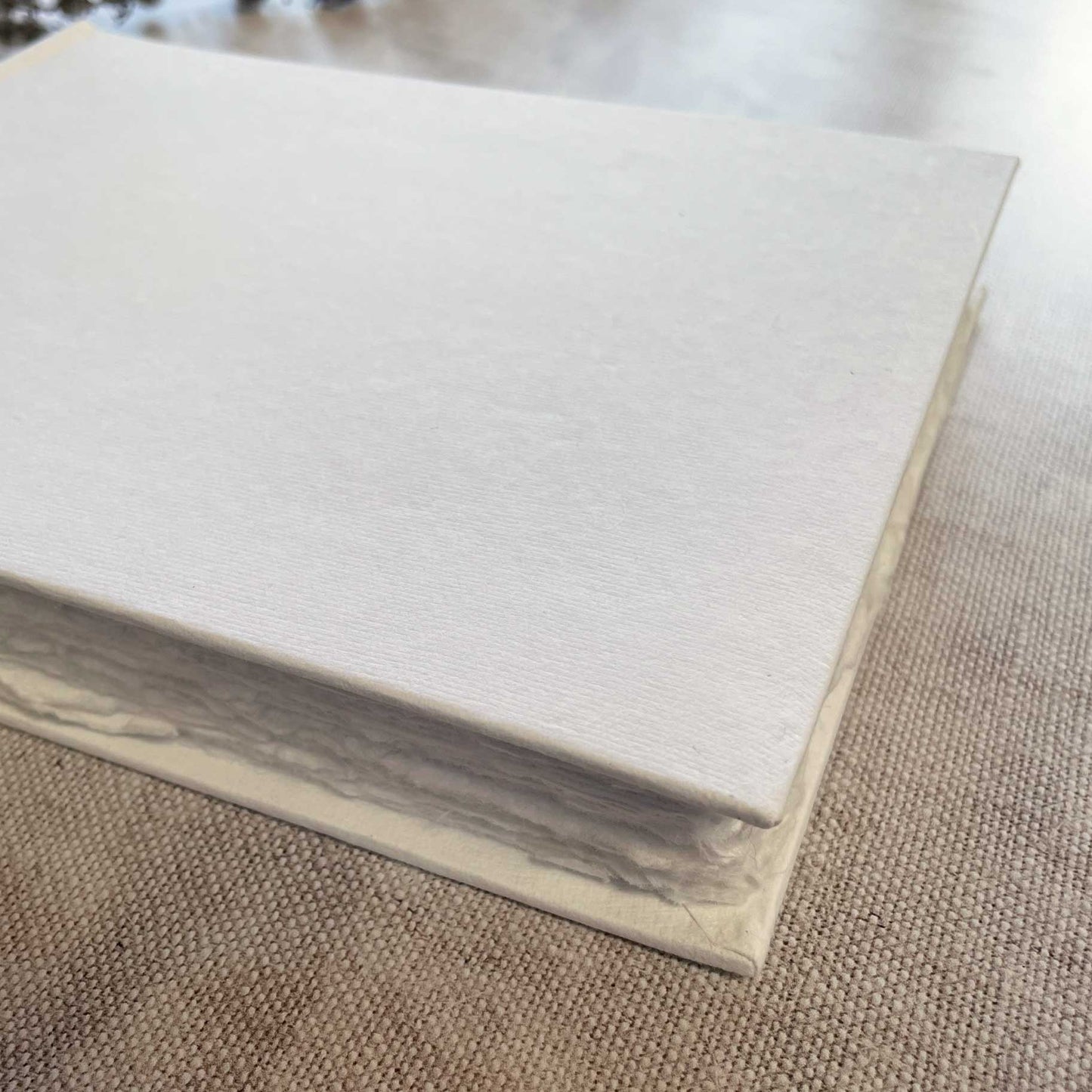 White handmade paper guest book with a hard cover.  Blank journal to decorate yourself.  by The Natural Paper Company