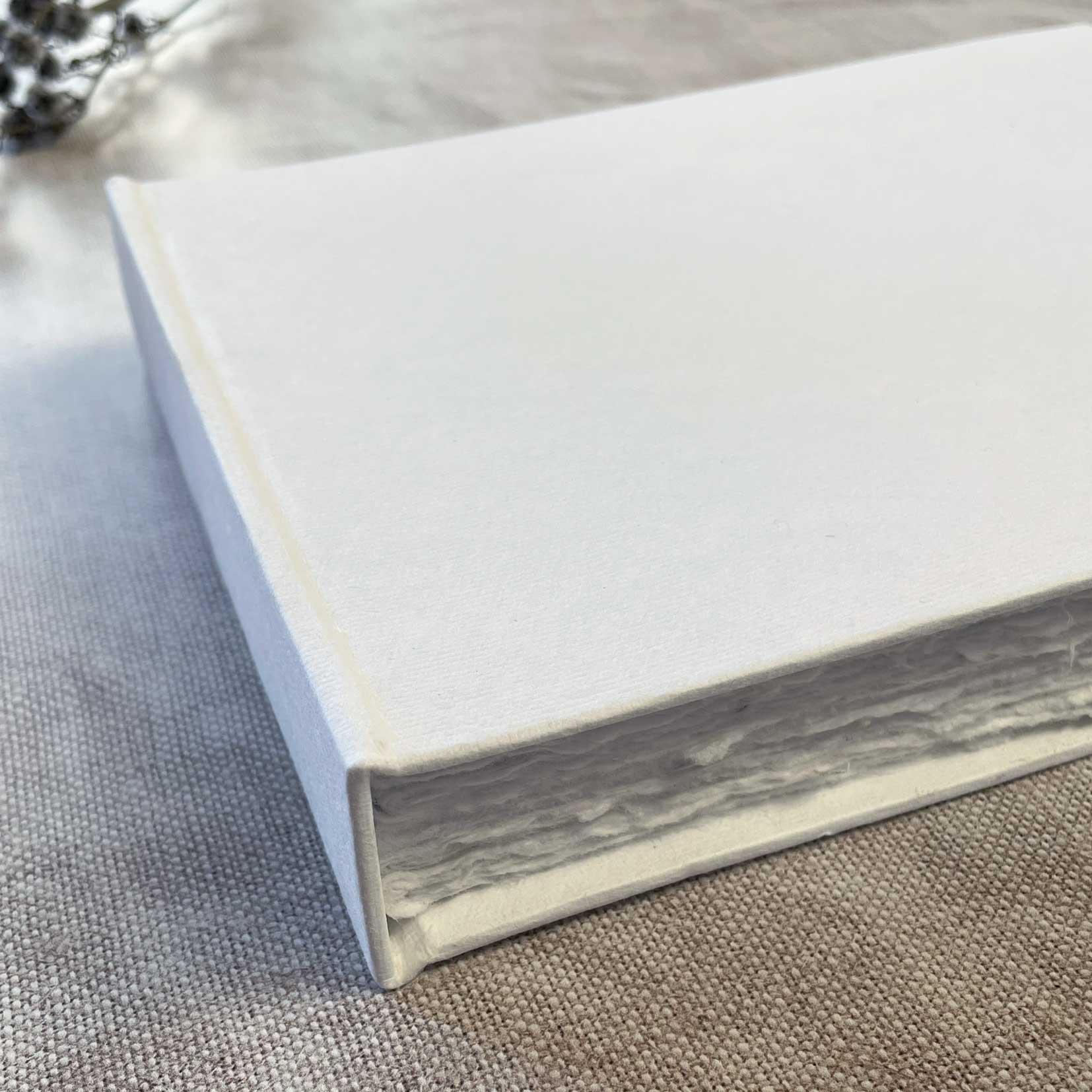 Blank guest book with a hard cover.  Blank journal notebook made from handmade paper with a deckled edge.  by The Natural Paper Company