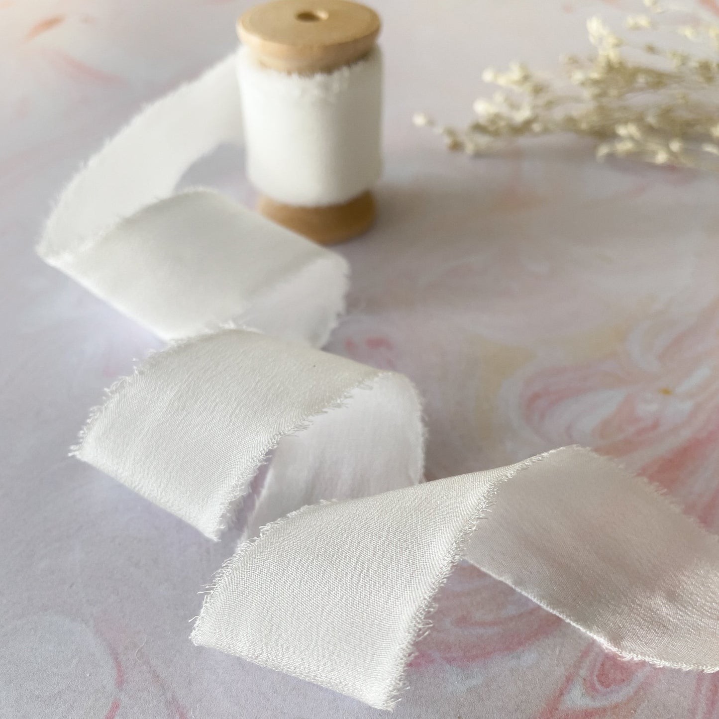 White silk ribbon for crafts.  Luxury ribbon for floristry and wedding stationery.  By The Natural Paper Company.