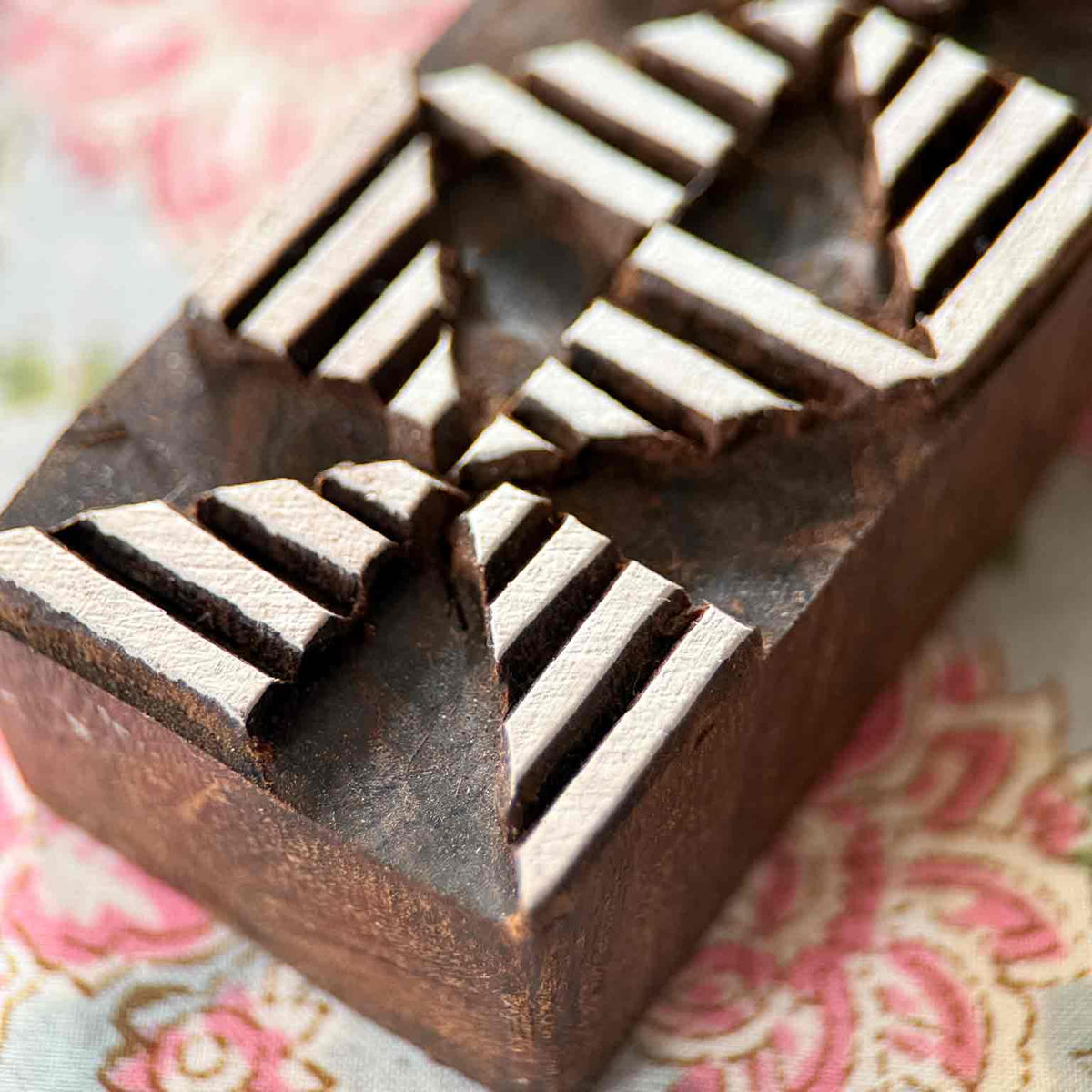 Close-up Windmill Border Indian Wood Block Stamp showing striped geometric sections arranged in a repeating rotational pattern.