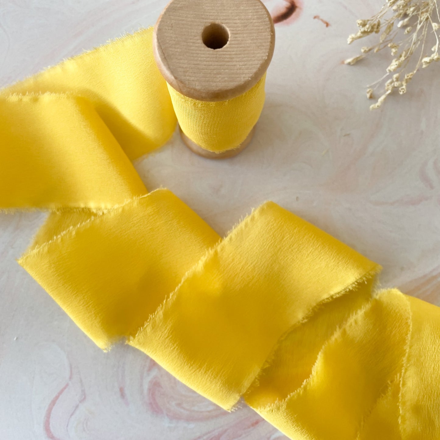 Yellow silk ribbon By The Natural Paper Company.  Luxury silk tibbon for crafts and floristry