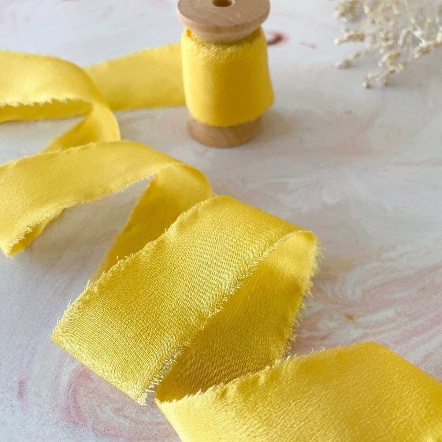 Habotai silk in yellow.  Luxury silk ribbon for floristry and crafts.  By The Natural Paper Company.