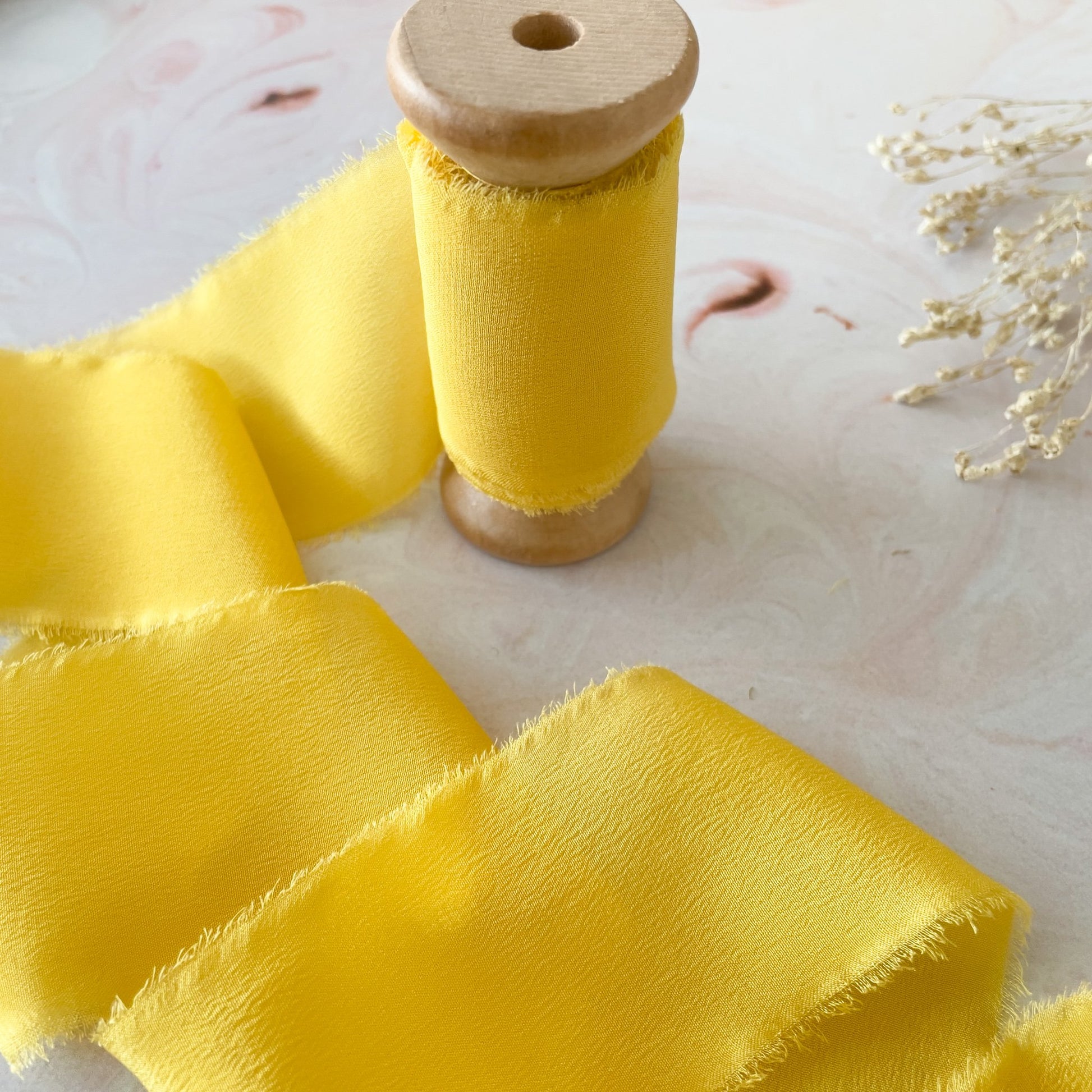 Silk ribbon in yellow.  Luxury silk ribbon with a frayed edge.  By The Natural Paper Company.