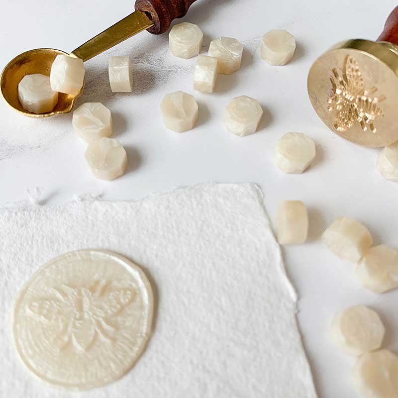 sealing wax beards in pearlised ivory.  Make stamps and seals with wax