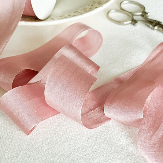 blush pink silk ribbon sold by the meter.  Luxury habotai silk ribbon in a blush pink colour.