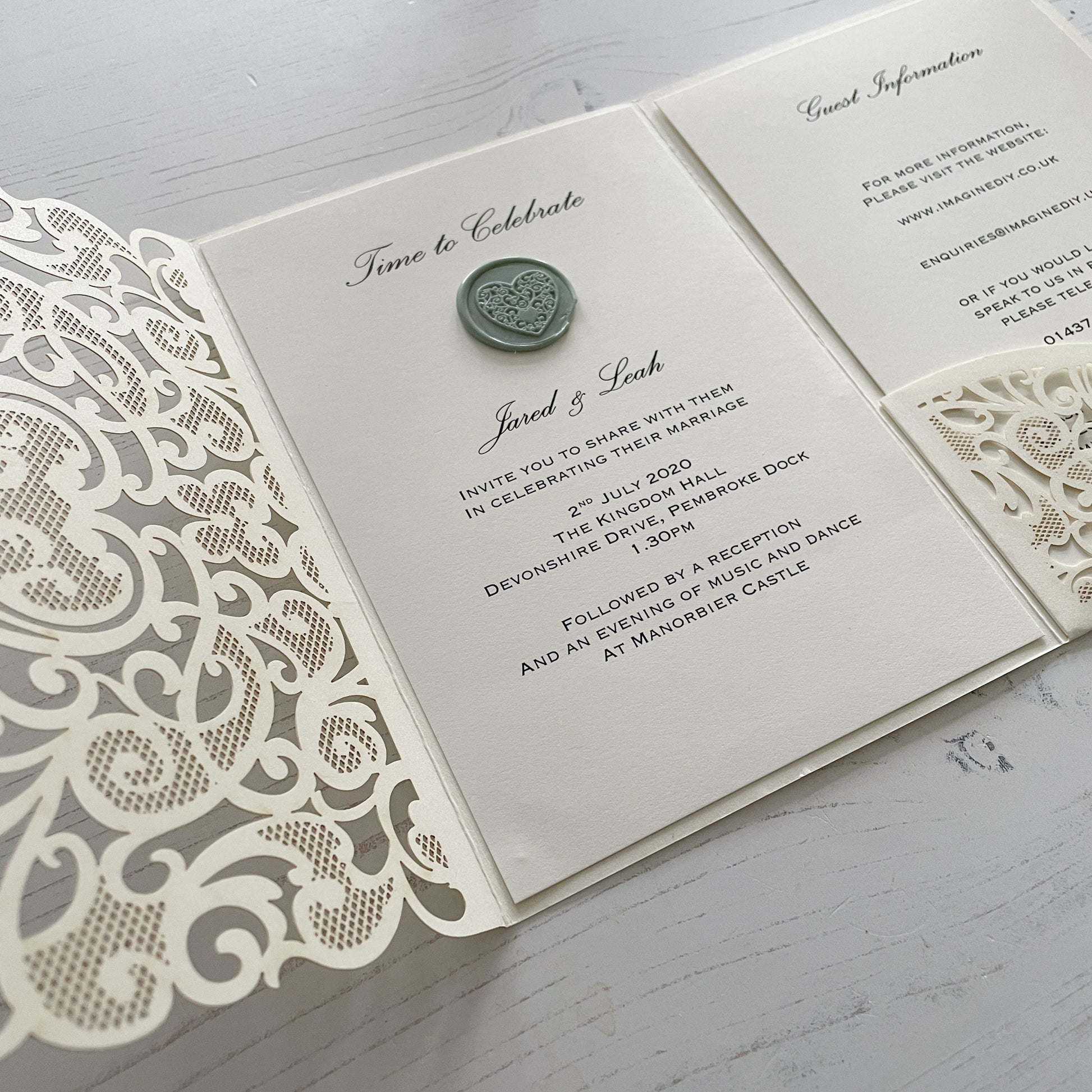 Wedding Invitation in ivory with sage green wax seal.  Wax stamp with heart shape.  