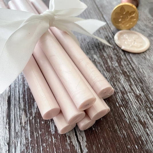 Blush pink sealing wax with a pearlised finish.  Blush pink wax for making wax stamps and envelope seals.