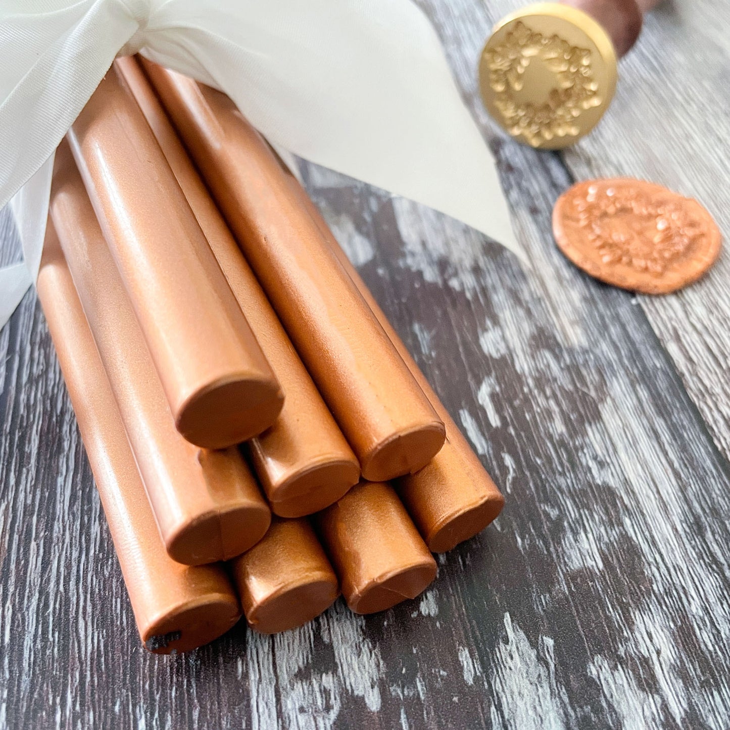 Eco friendly sealing wax in copper.  11mm wax seal sticks that can be used in a glue gun or with a melting spoon.  Plastic free, Paraffin free and biodegradable wax By The Natural Paper Company