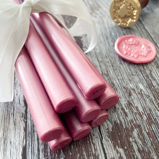 Dusky pink colour sealing wax.  Pearlised dusky pink wax sticks for making wax seals.  
