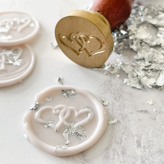 silver leaf flakes to decorate wax seals and sealing wax.  SIlver leaf flakes
