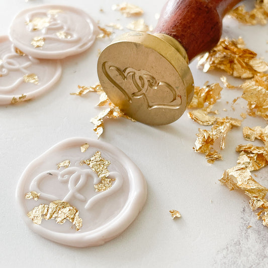 Gold leaf flakes for adding to wax seals and stamps.  Small flakes of gold leaf.  Wax seal supplies.